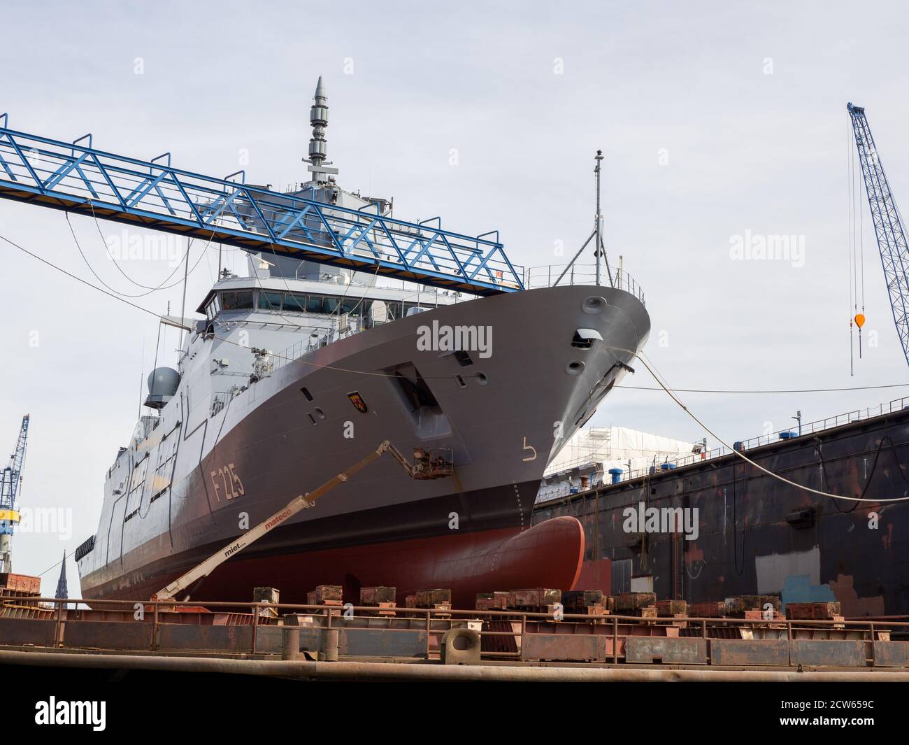 A frigate is being repaired in a dry dock at Blohm und Voss in Hamburg ...