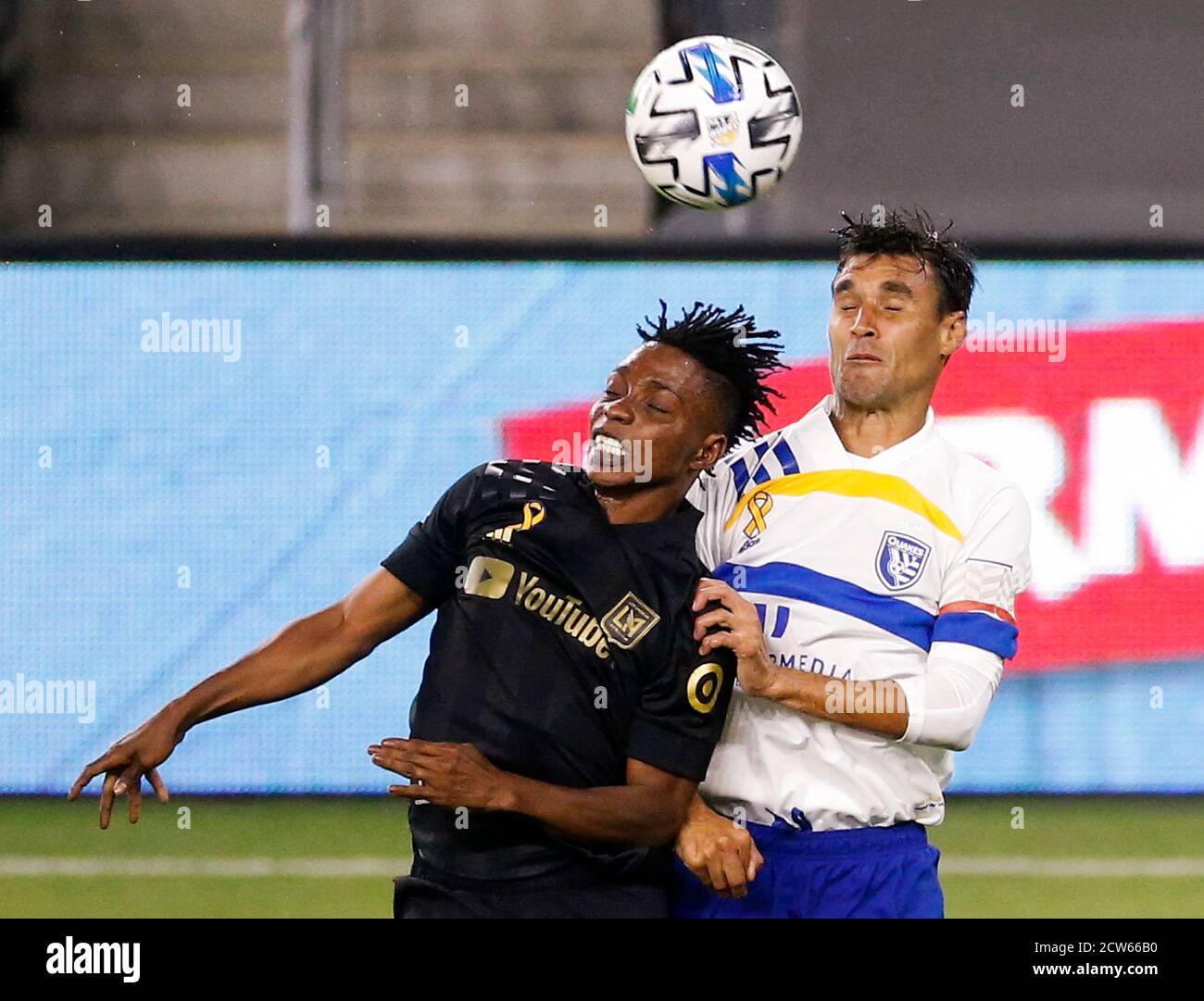 Los Angeles, California, USA. 27th Sep, 2020. Los Angeles FC forward Latif Blessing (7) of Ghana, and San Jose Earthquakes forward Chris Wondolowski (8) fight for the ball during the second half of a Major League Soccer match in Los Angeles, Sunday, Sept. 27, 2020. The Earthquakes won 2-1. Credit: Ringo Chiu/ZUMA Wire/Alamy Live News Stock Photo