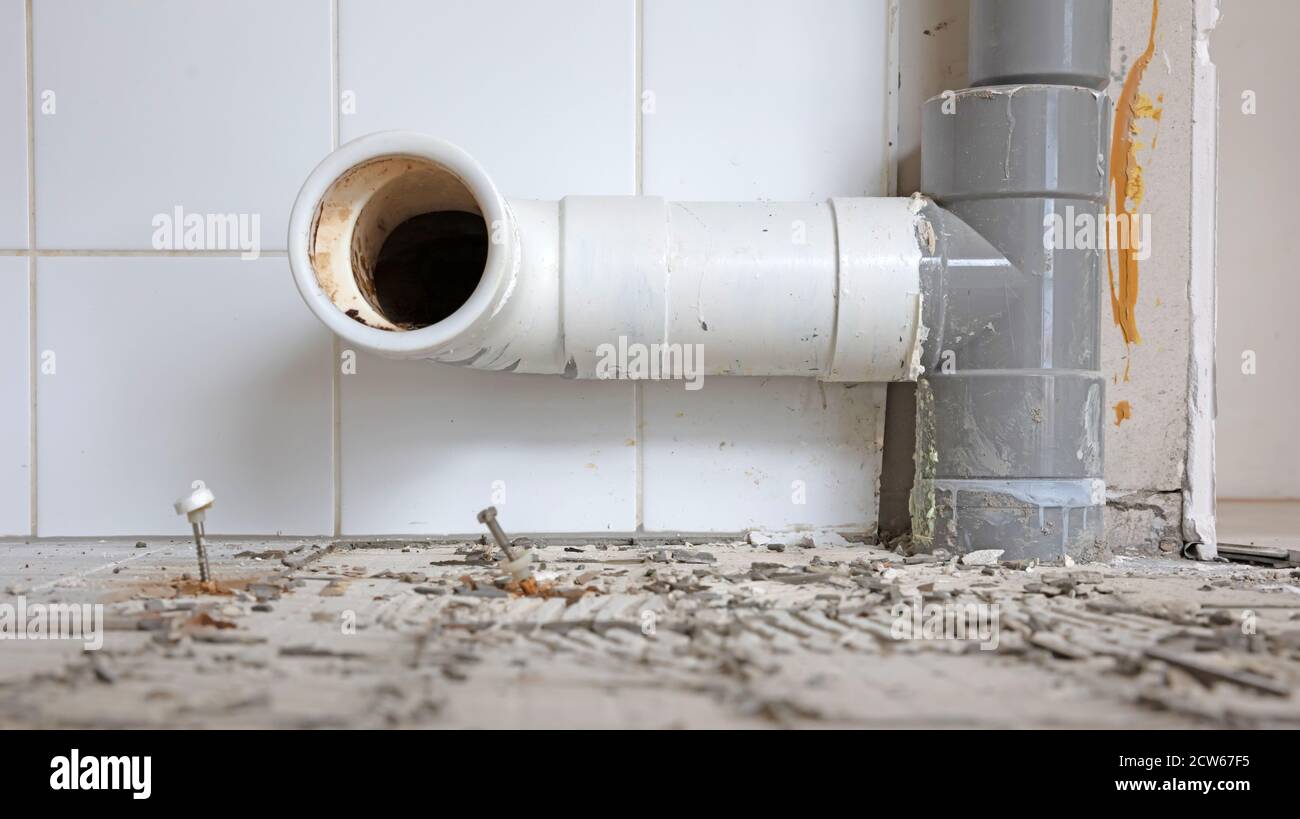 Close up drainage pipe of the toilet, reconstructing the toilet Stock Photo  - Alamy