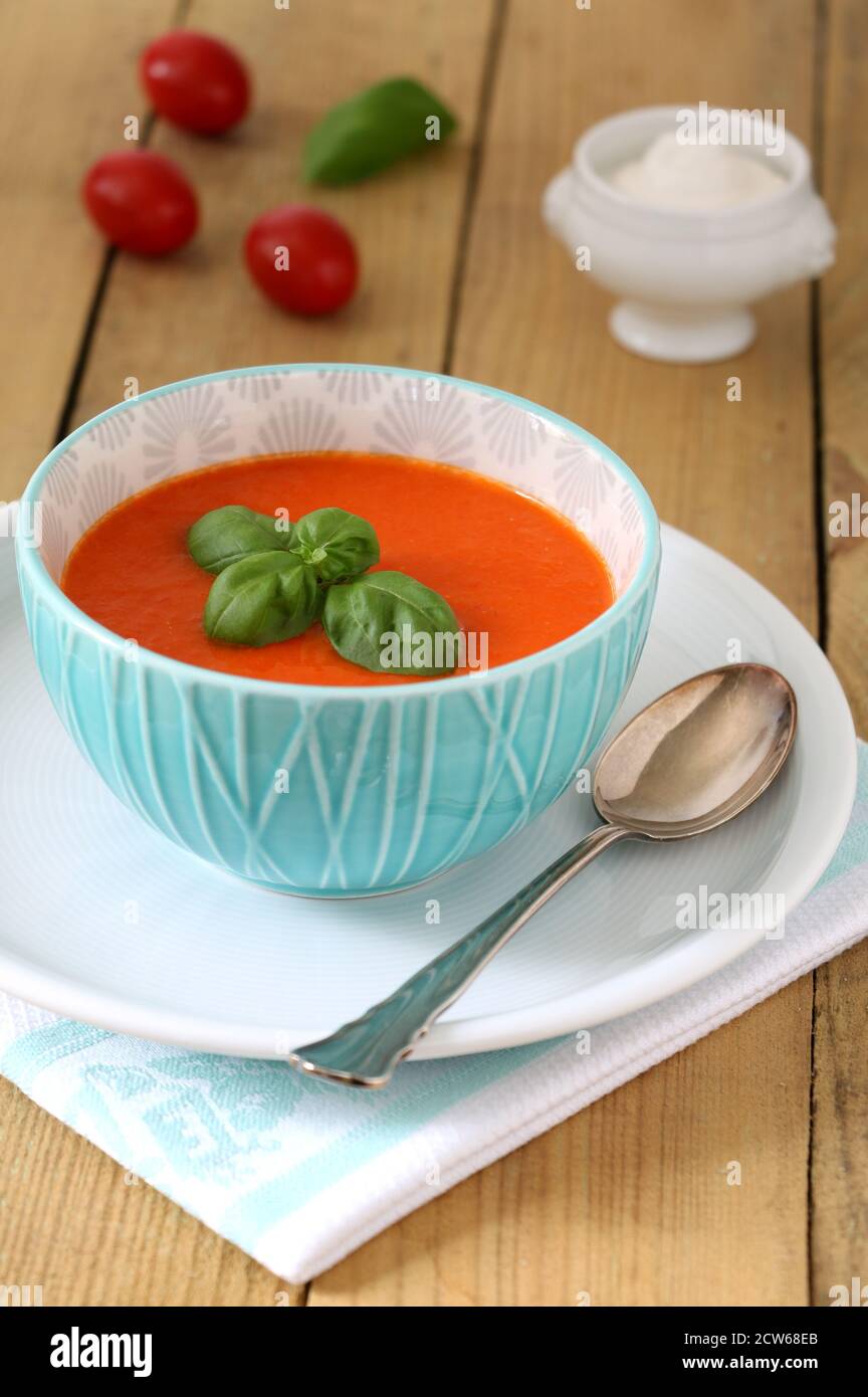 sweet papper soup in the bowl on the table Stock Photo