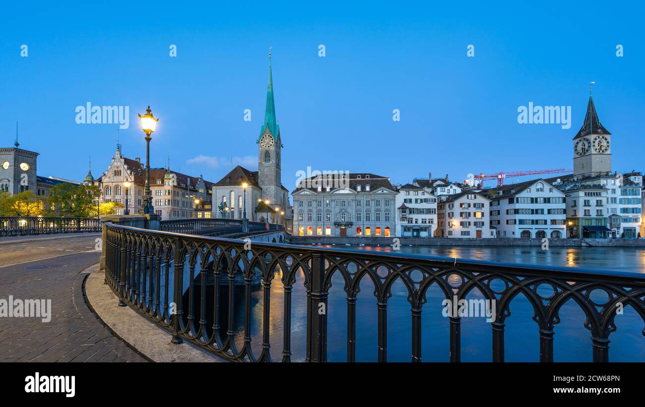 Night view of Zurich city with view of Fraumunster church in Switzerland. Stock Photo