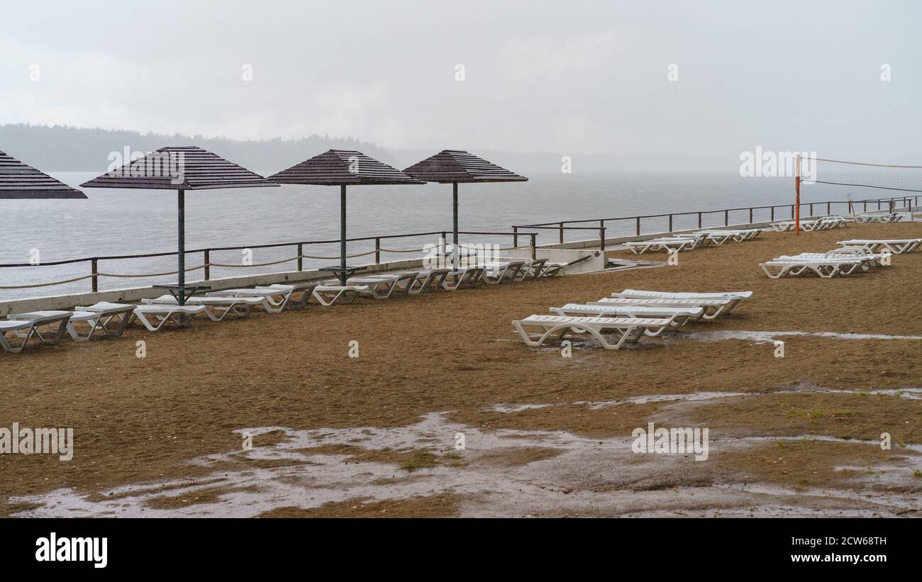 Domestic touristic resort in the cold rainy day. Holidays concept. Wet autumn is coming. Summer holidays is finished Stock Photo