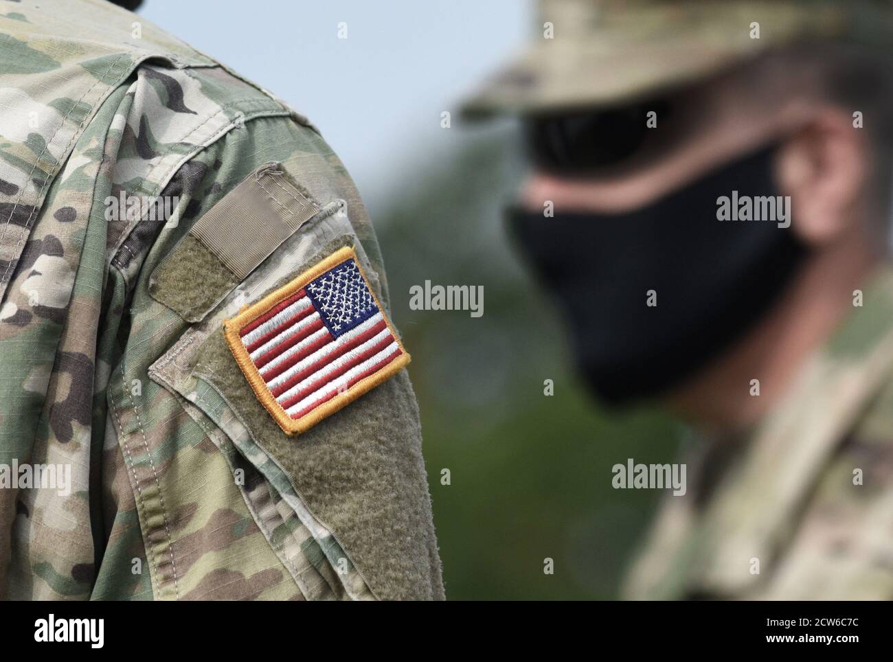 US soldiers wearing protective face masks. Quarantine in army Stock Photo Alamy