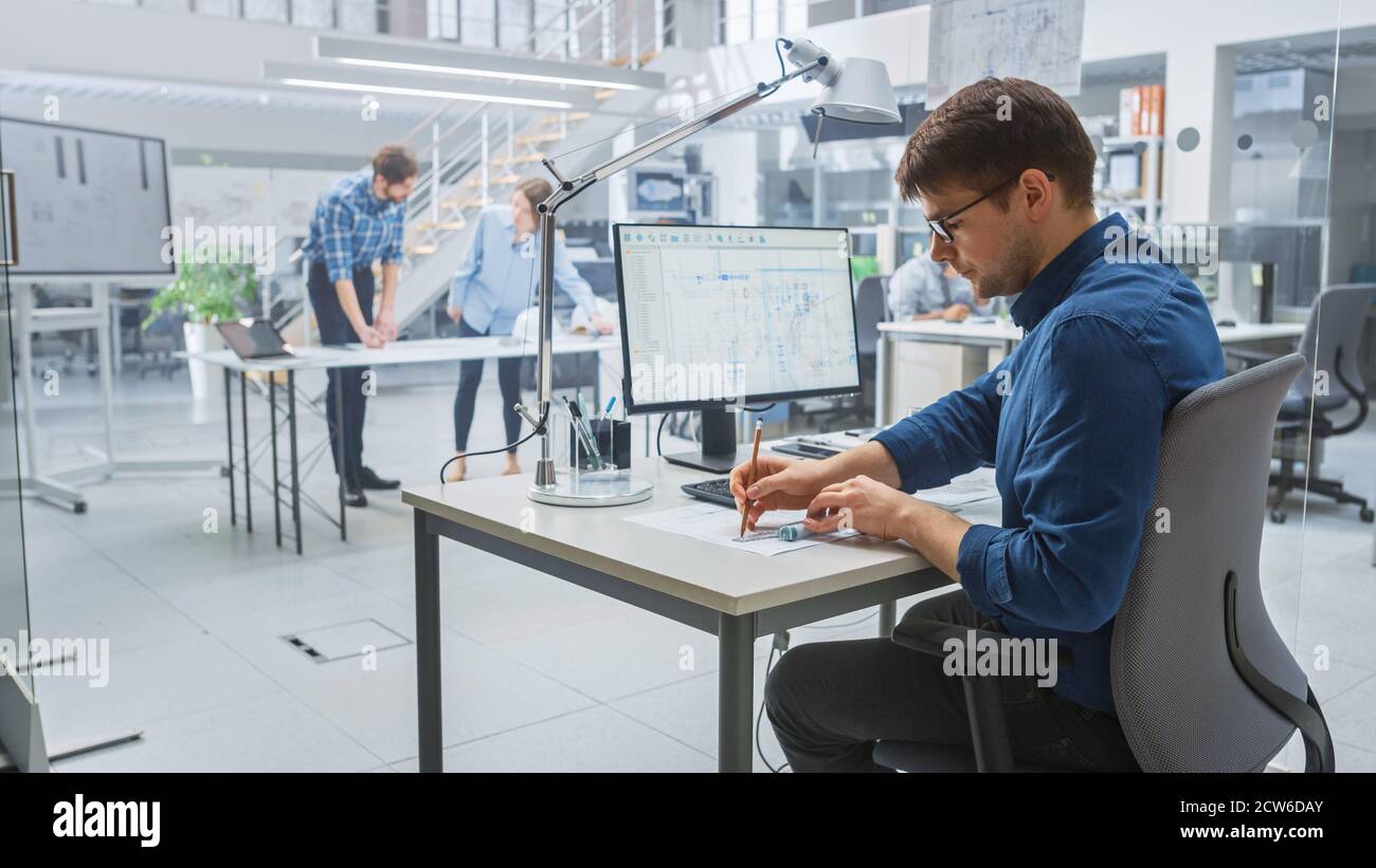 In the Busy Engineering Facility: Diverse Group of Engineers ...