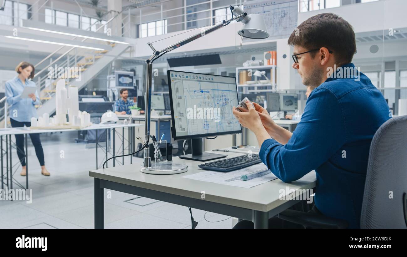 Architect Team Computer In Architectural Bureau: Team of Architects and Engineers Working on a ...