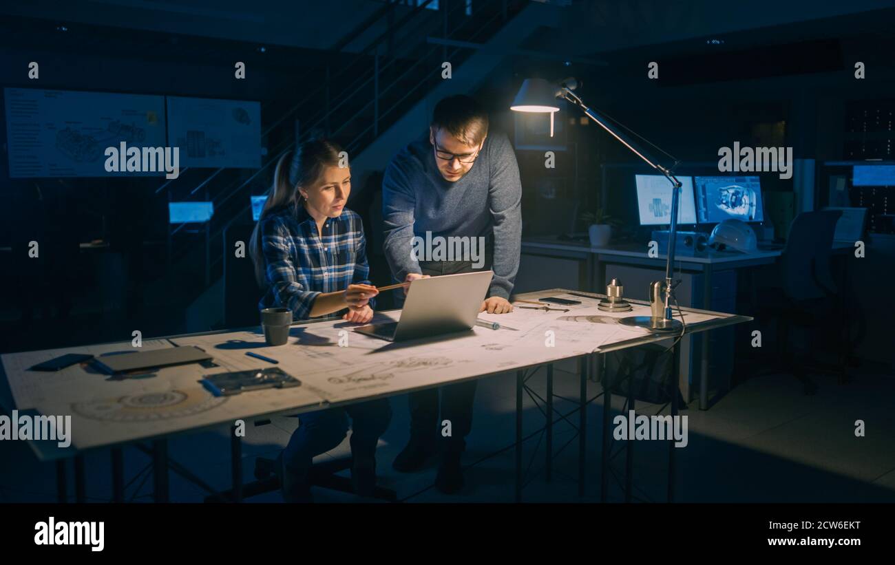 Industrial Engineering Facility: Female Engineer Working on Desktop ...