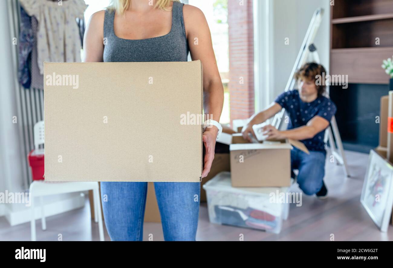 Box carrying man midsection hi-res stock photography and images - Alamy