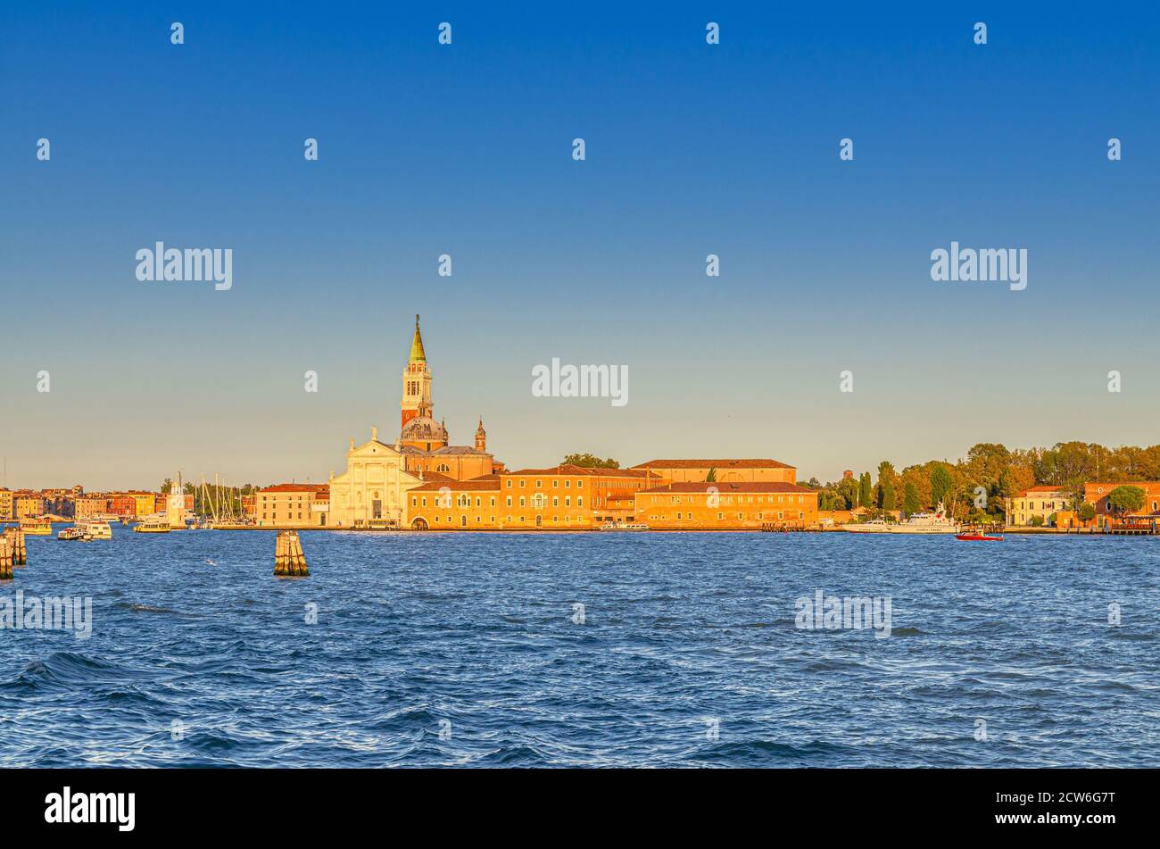 San Giorgio Maggiore island with Chiesa di San Giorgio Maggiore catholic church and campanile bell tower, Giudecca Canal of Venetian Lagoon water, Venice city, Veneto Region, Northern Italy Stock Photo