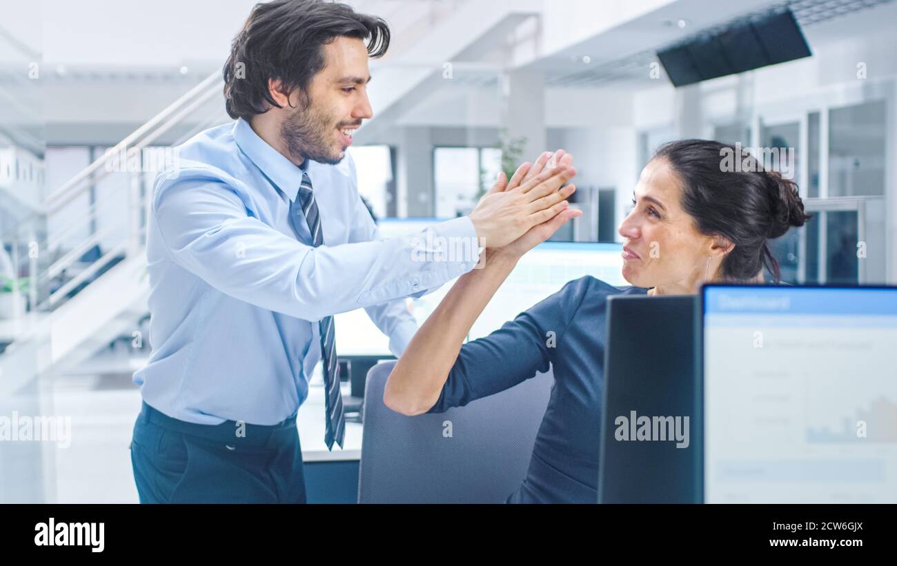 Success Workers Office workers celebrate success desktop hi-res stock photography and ...