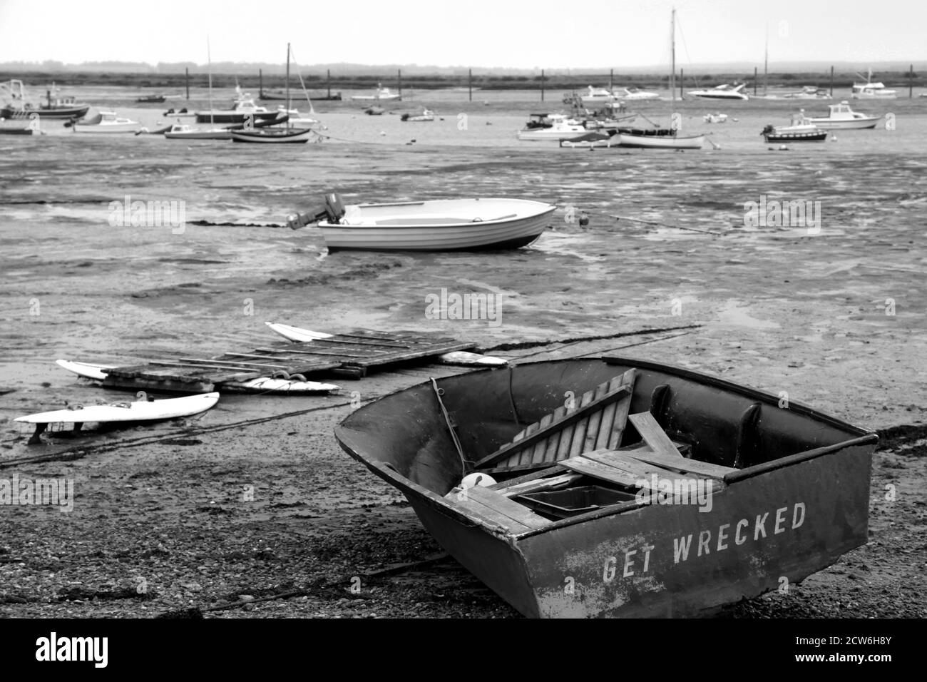 Yachts and tenders on the Blackwater Estuary on Mersea Island Essex Stock Photo