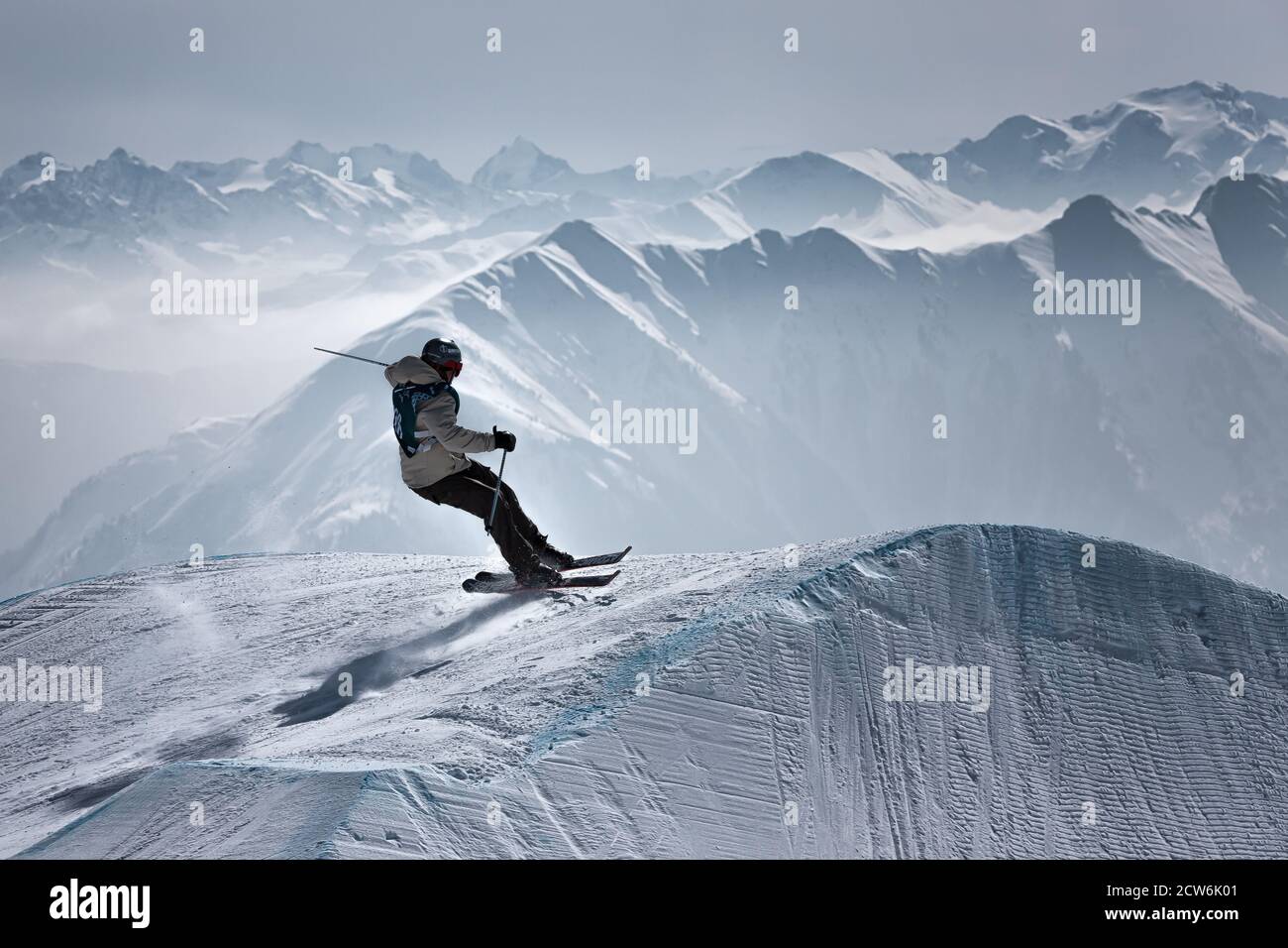 Freeskier on a ski jump in Laax Stock Photo
