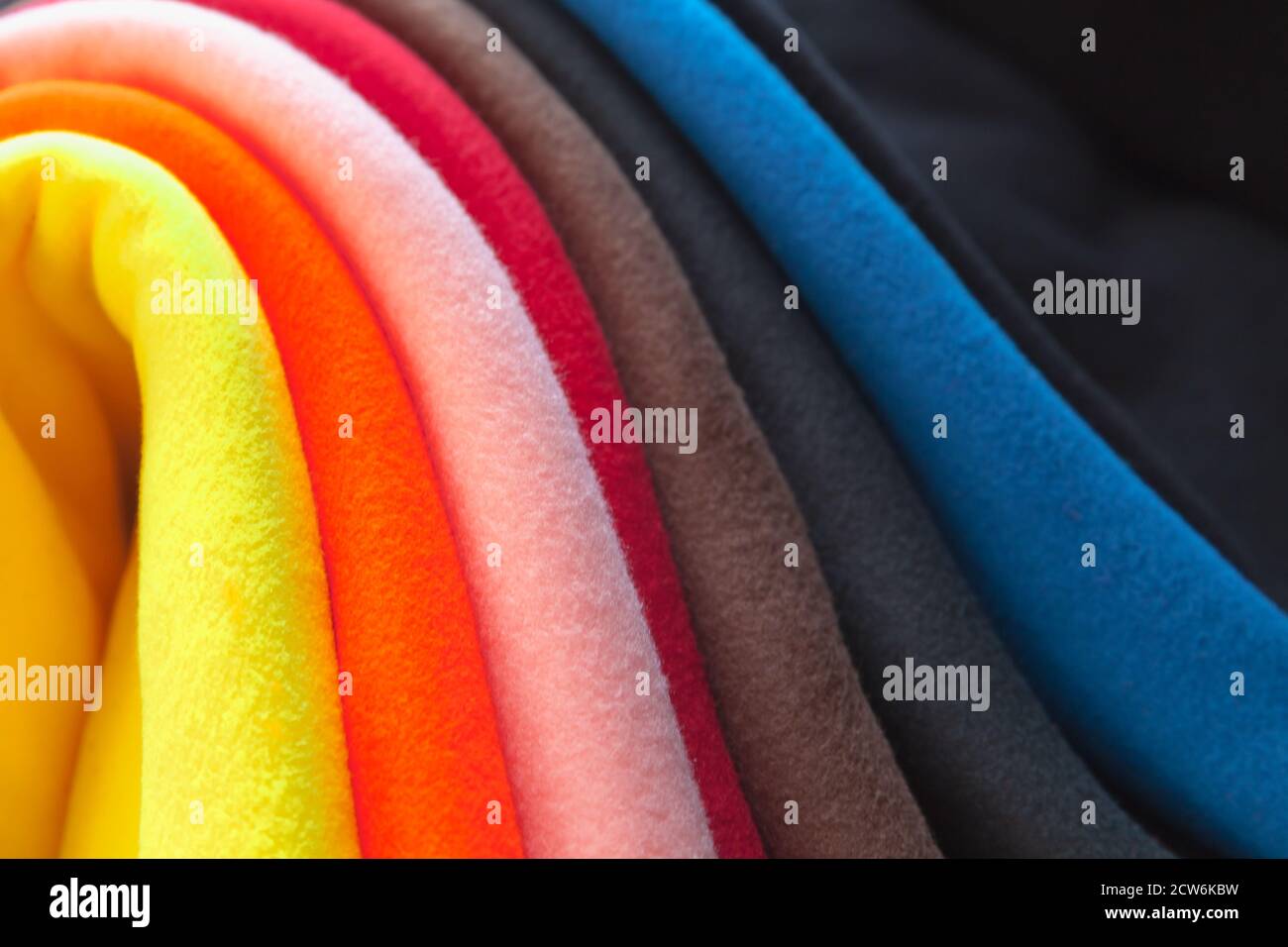 Colorful fleece. Background texture of soft napped insulating fabric made of polyester Stock Photo