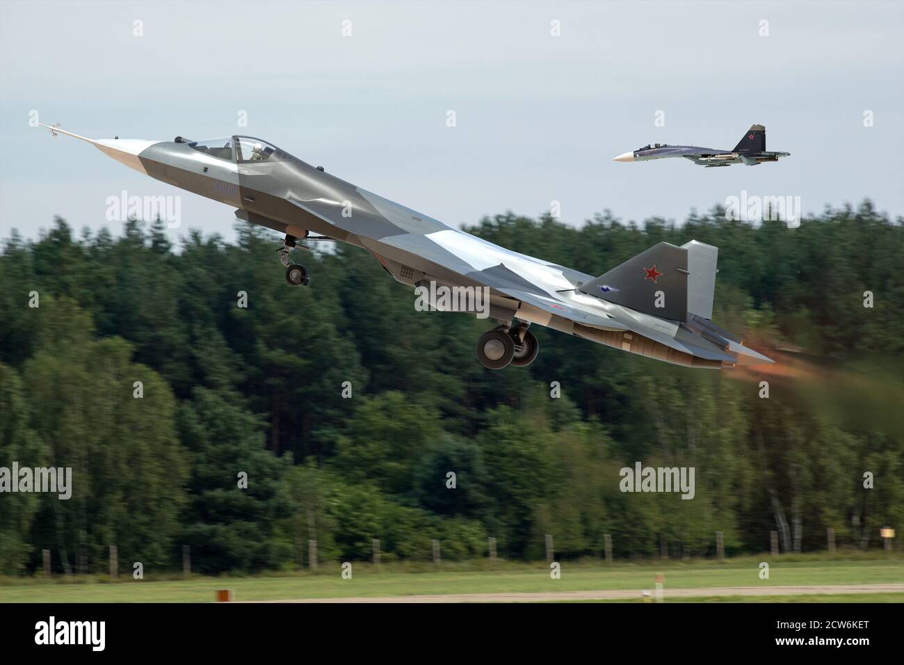 Sukhoi SU-57, a Russian-made 5th generation fighter, during a dynamic start with an afterburner Stock Photo