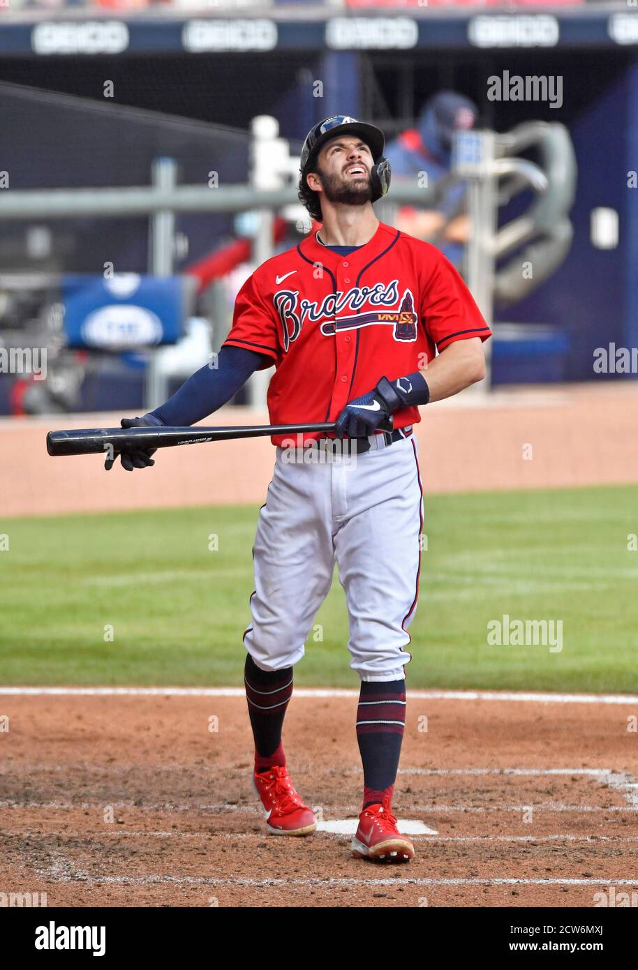 Dansby Swanson #7 of the Atlanta Braves looks on from third base during a  pitching change in the sixth inning during MLB g…