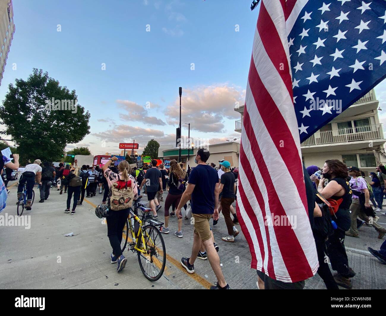 Louisville, Downtown, USA. 27th Sep, 2020. Upside down flag is waived during a march which a thousand or more people attended, demanding Justice for Breonna Taylor and Police Reform. Credit: Amy Katz/ZUMA Wire/Alamy Live News Stock Photo