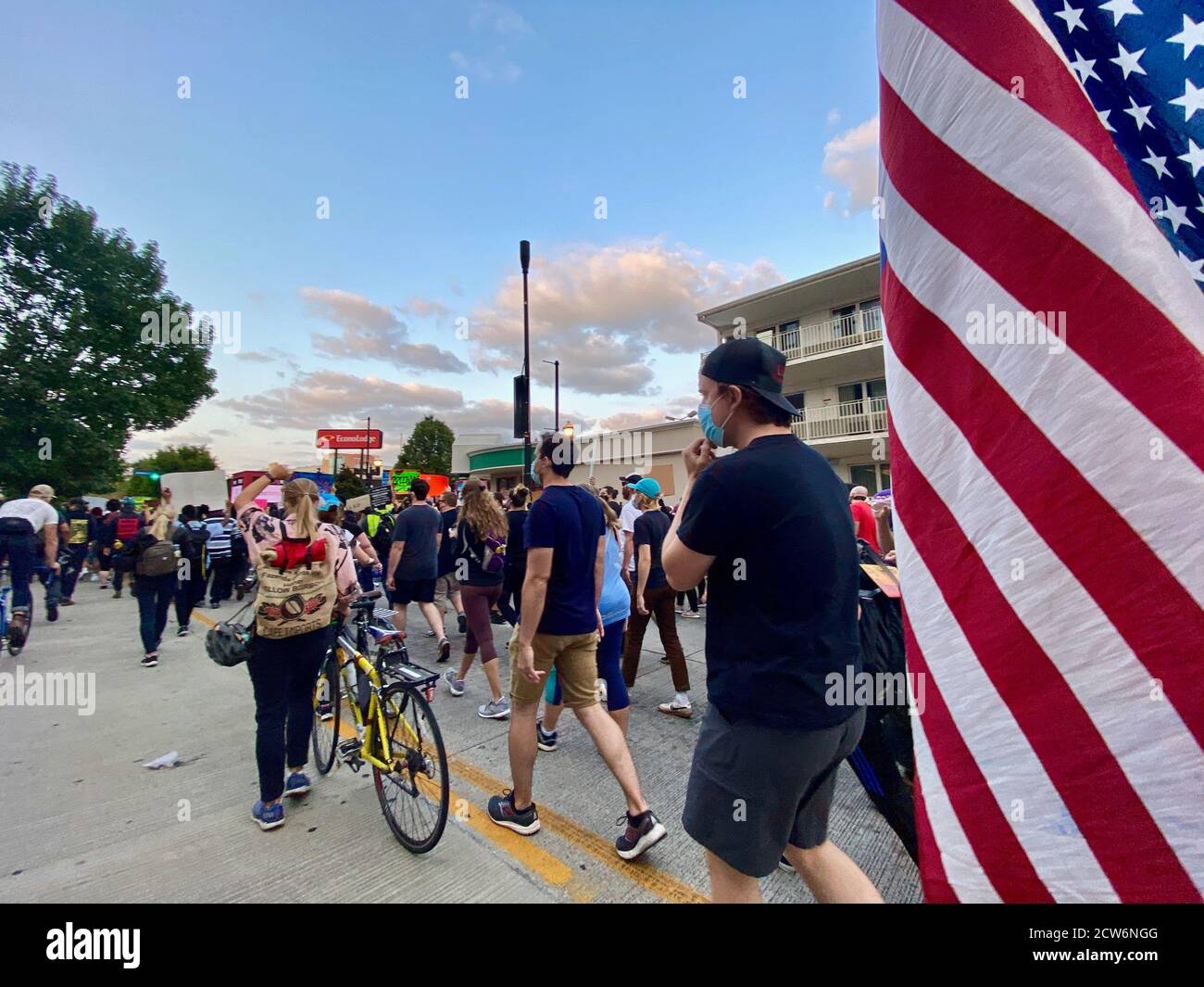 Louisville, Downtown, USA. 27th Sep, 2020. Upside down flag is waived during a march which a thousand or more people attended, demanding Justice for Breonna Taylor and Police Reform. Credit: Amy Katz/ZUMA Wire/Alamy Live News Stock Photo