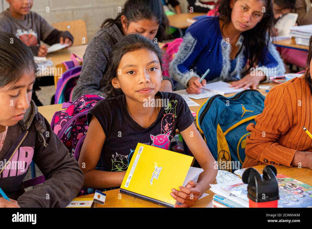 joven escribiendo, escuela de primària, Patzojón Chiquito, Quiche, Guatemala, America Central Stock Photo