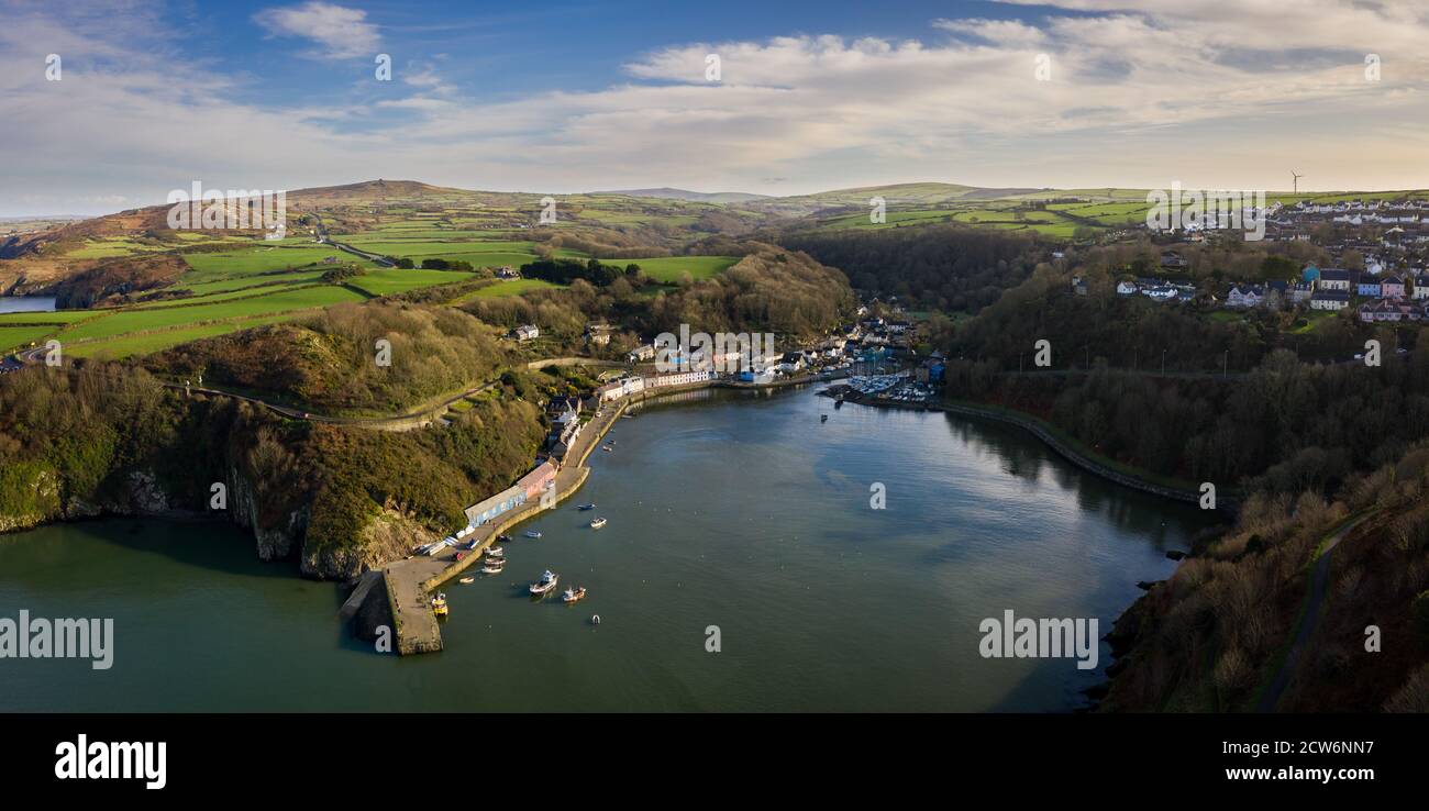 Fishguard is a coastal town in Pembrokeshire, Wales, UK. The town is small and  divided into two parts, the main town of Fishguard and Lower Fishguard Stock Photo
