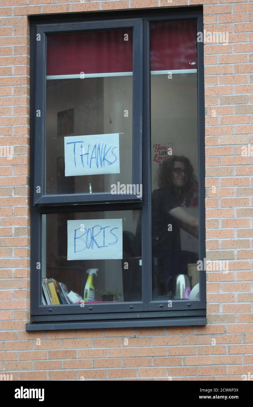 Signs on a window at Manchester Metropolitan University's Birley campus where hundreds of students have been told to self-isolate after 127 of them tested positive for coronavirus. Stock Photo