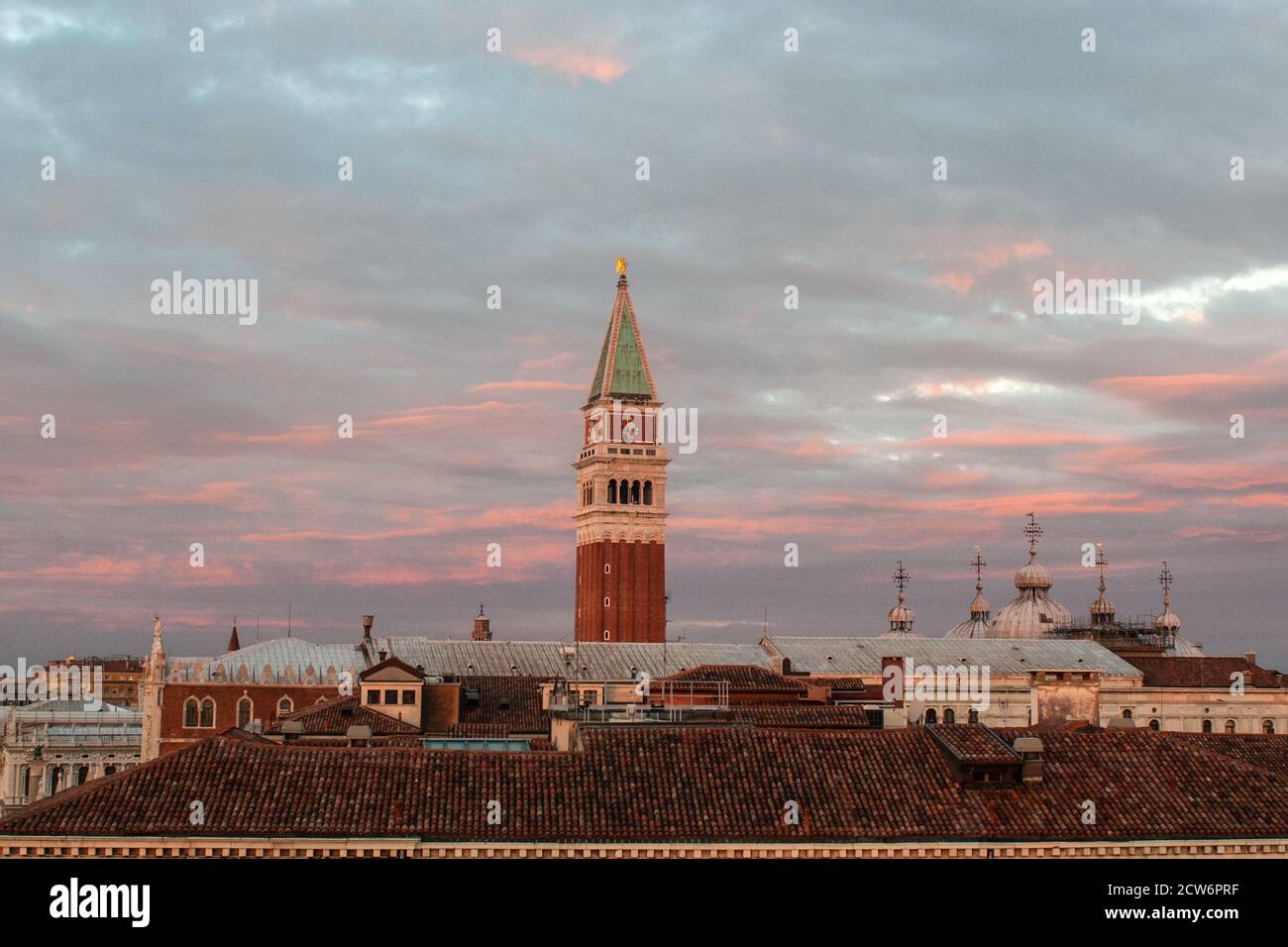 VENICE, ITALY - FEBRUARY 26 2017:  A view of sunrise from the roof of Venice, Italy with San Marco's bell tower in the middle Stock Photo
