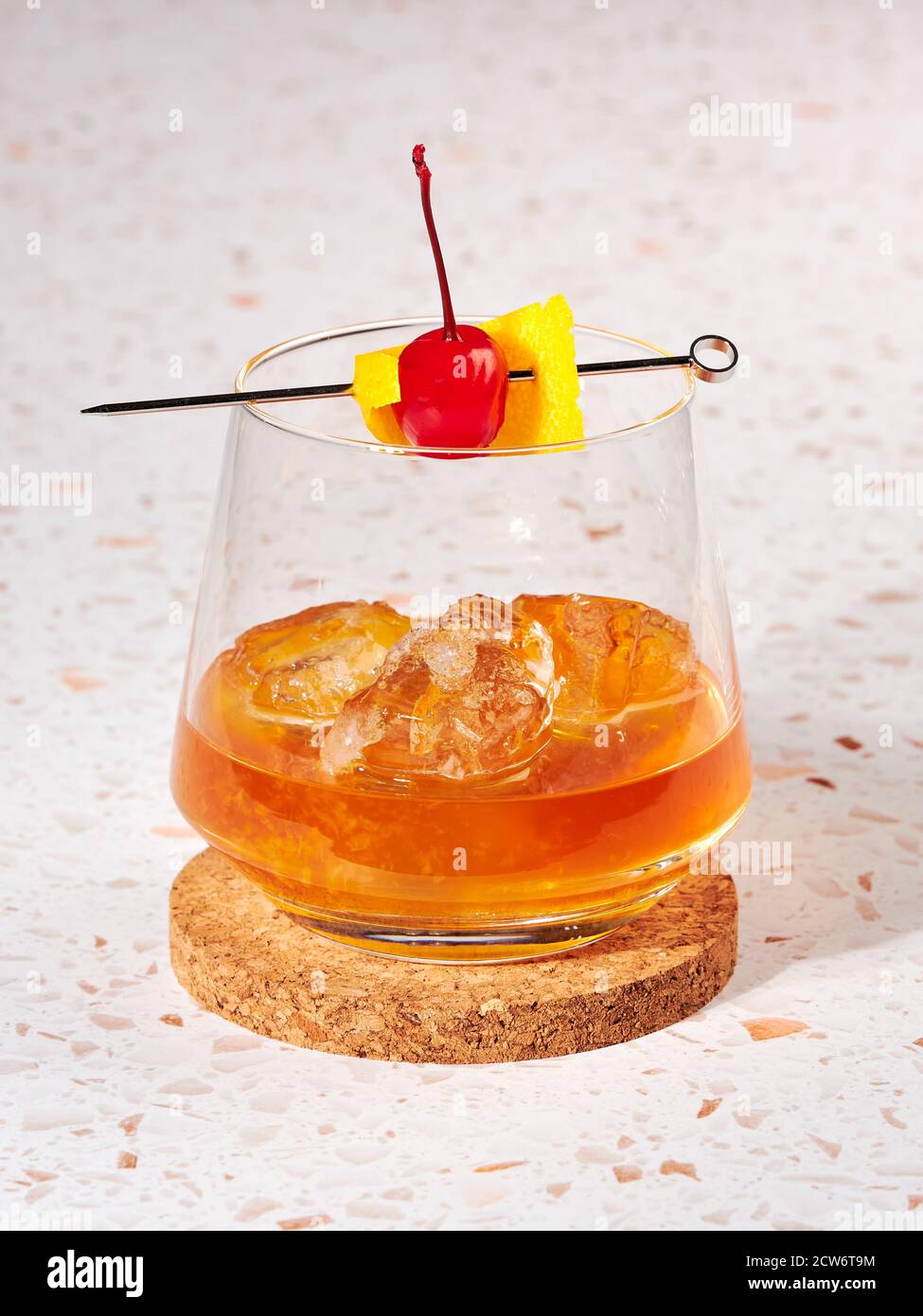 Old fashioned a cocktail made by muddling sugar with bitters, then adding bourbon, and a twist