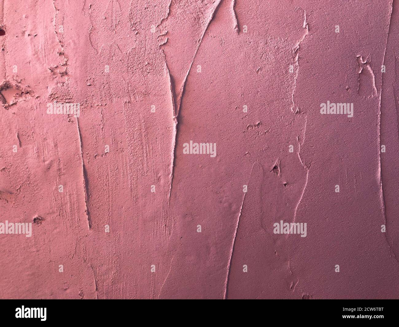 Textured magenta colored plaster. Wall stucco texture. Plastered background Stock Photo