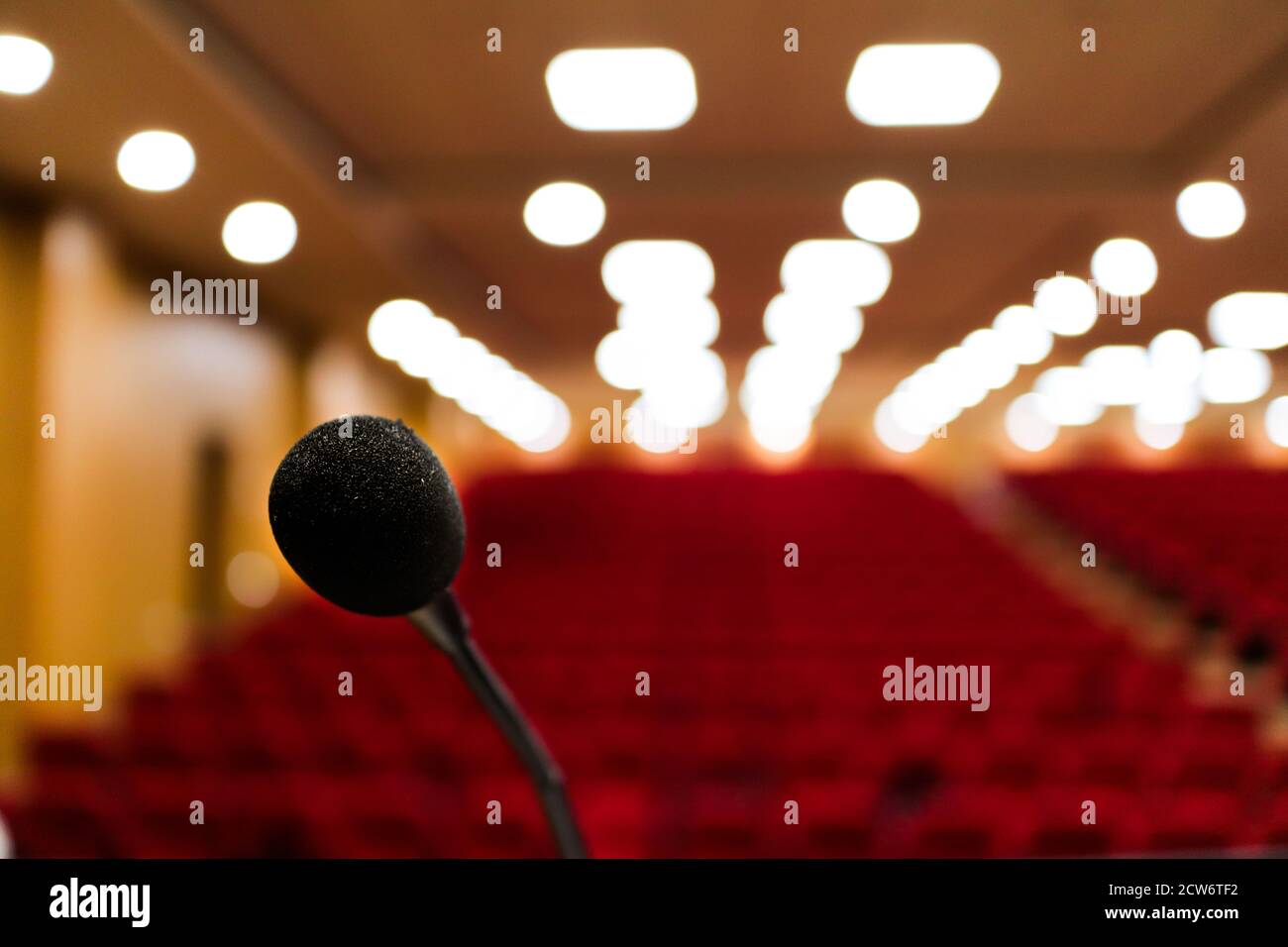 close up photo of a microphone with blurred background and bokeh lights ...