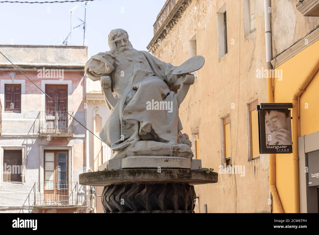 FIGUERES, SPAIN-AUGUST 8, 2020: Statue of french painter and sculptor Ernest Meissonier near the Salvador Dali Theatre and Museum Stock Photo