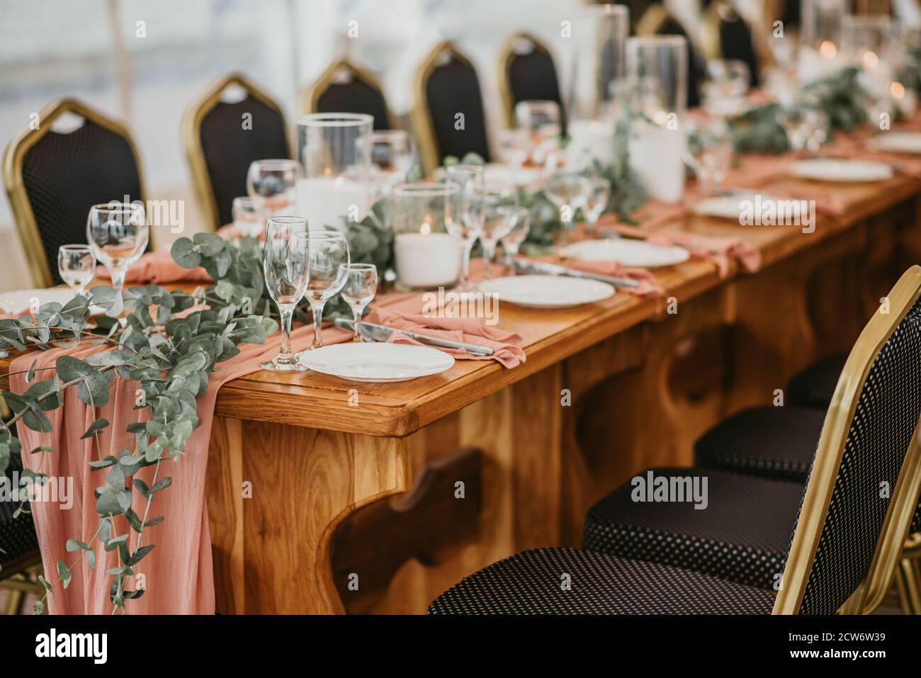 Beautiful wedding table setting decorated with flowers and candles ...