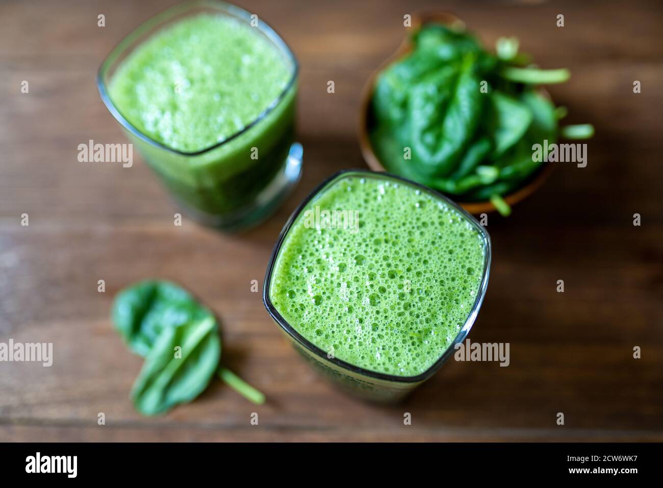 Spinach smoothie made with banana, baby spinach and spirulina powder