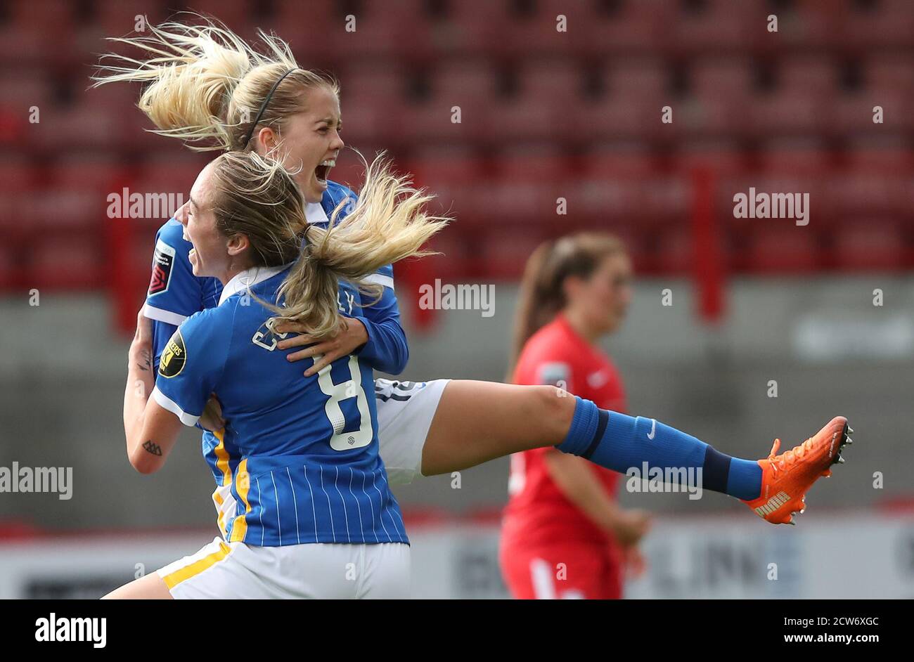Brighton's goal scorer Denise O'Sullivan celebrates scoring the equaliser 2-2 with Brighton's Megan Connolly during the Vitality WomenÕs FA Cup quarter-final match between Brighton & Hove Albion Women and Birmingham City Women at the PeopleÕs Pension Stadium in Crawley . 27 September 2020 Stock Photo