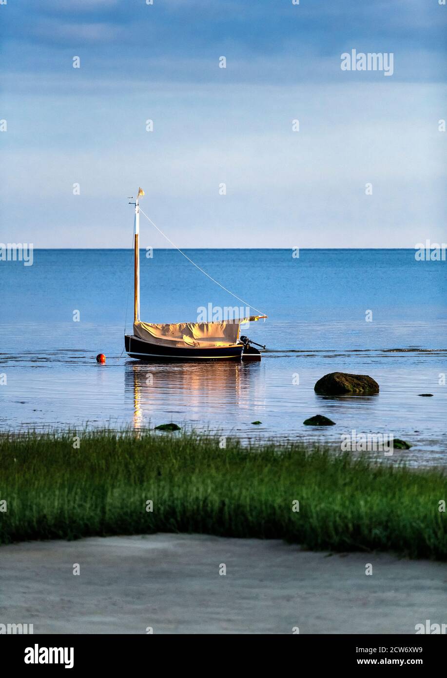 Sailboat sunrise at Breakwater Beach, Brewster, Cape Cod, Massachusetts