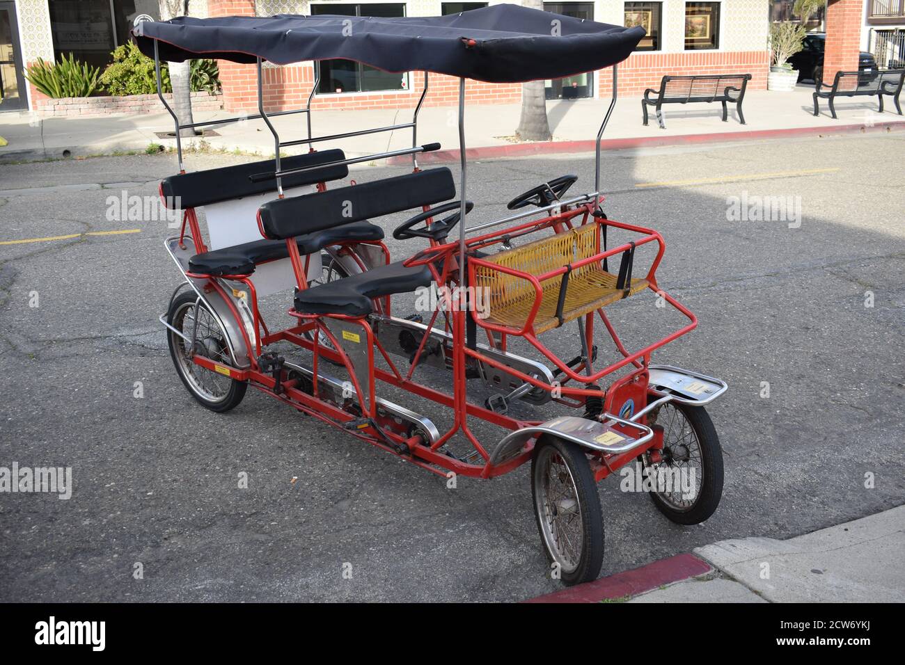 Bicycle with several seats in the street Stock Photo Alamy