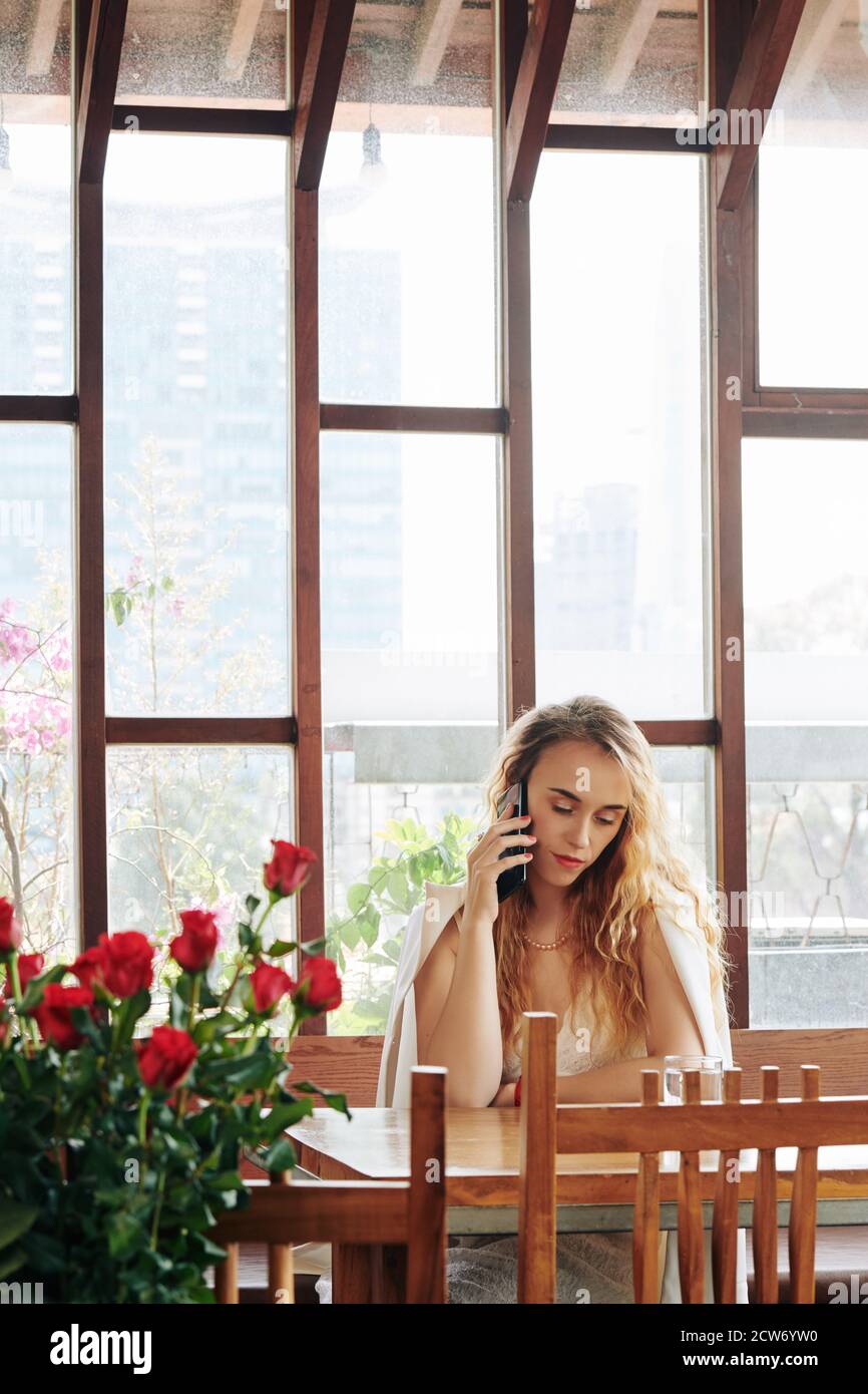 Young woman calling on phone Stock Photo