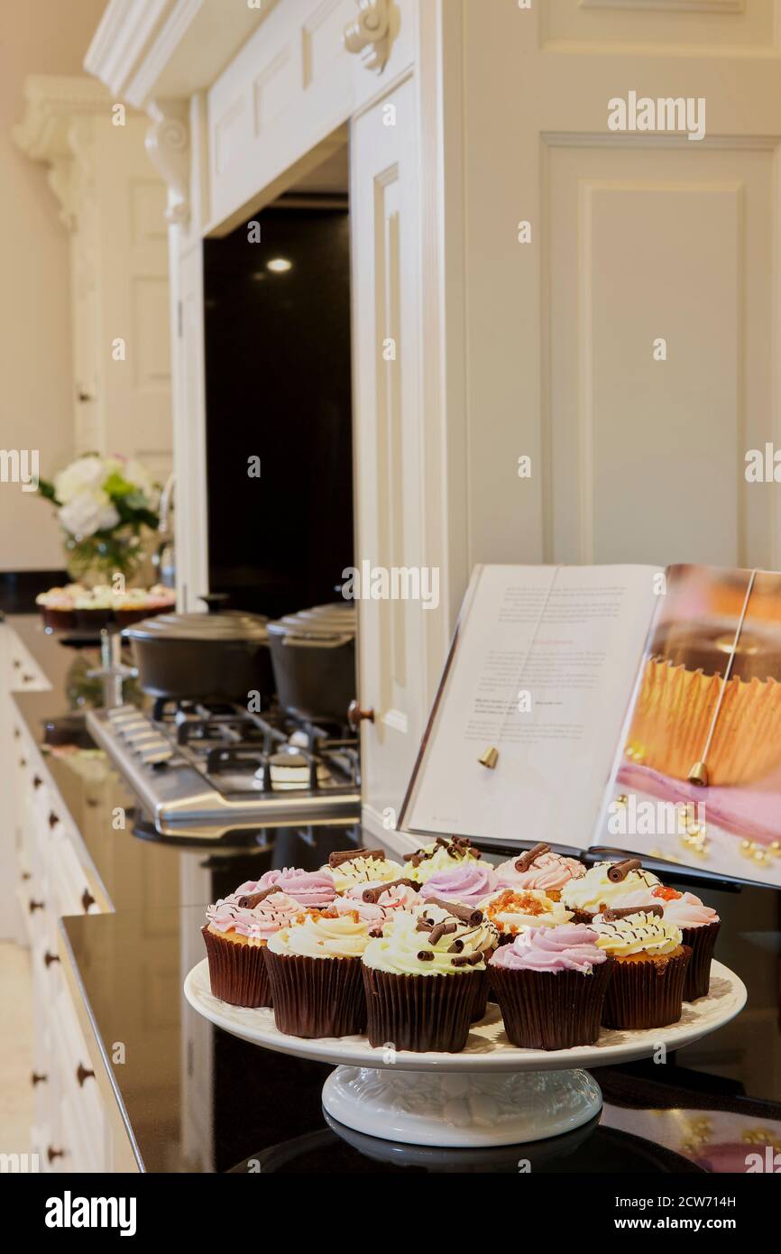 Cake stand in kitchen Stock Photo Alamy