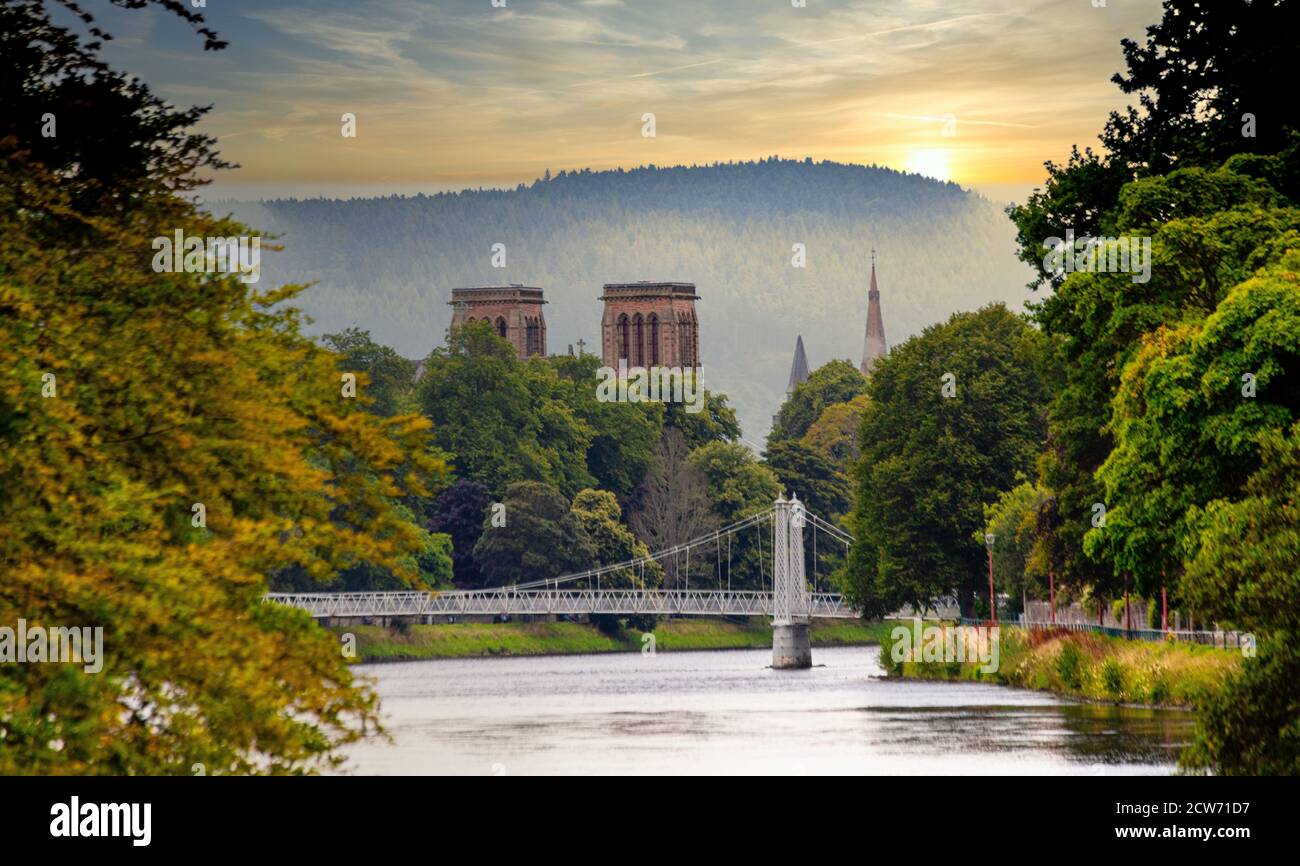 View of Inverness Castle and suspension bridge from Ness Islands,River Ness,  Inverness, Scotland Stock Photo