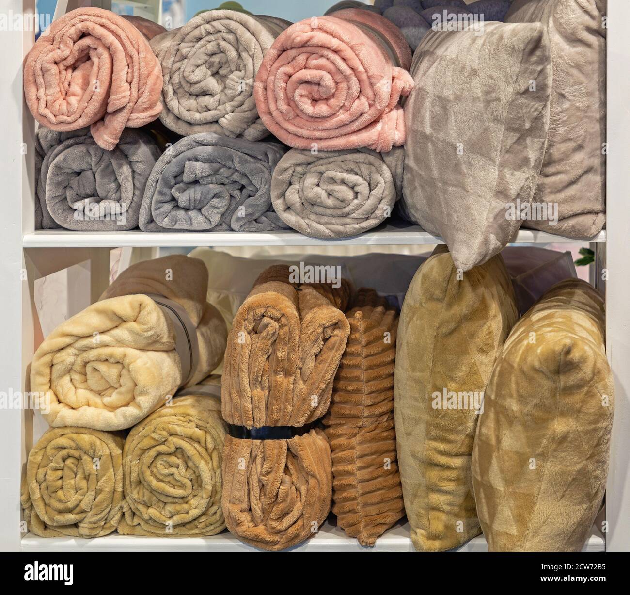 Roll Blankets and Soft Pillows at Shelf Stock Photo Alamy
