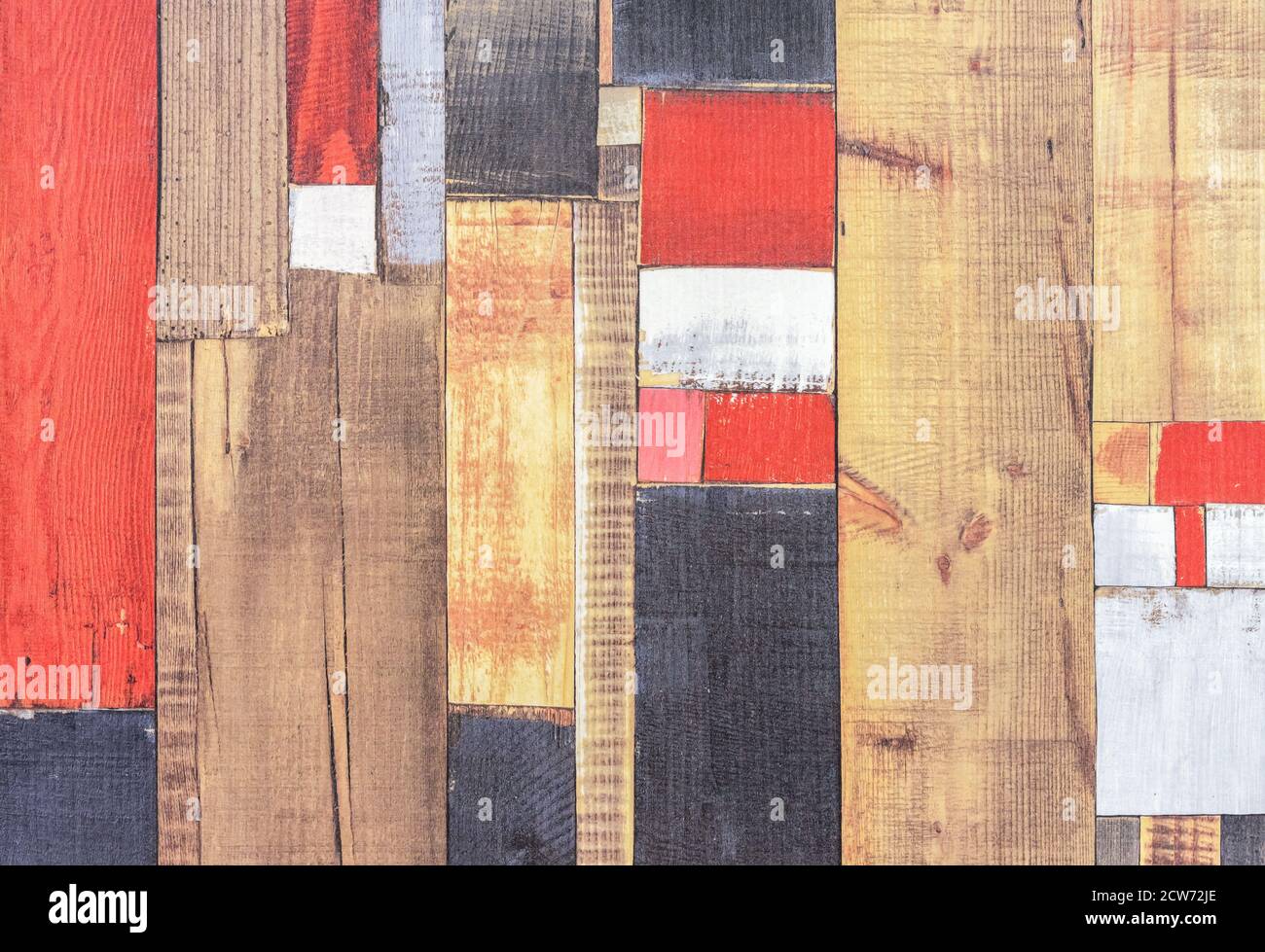 Old boards painted with multi-colored paint. Background from colored boards. Stock Photo