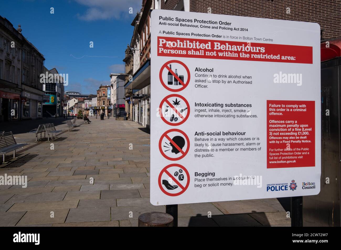 Prohibited behaviours sign in the town centre in Bolton Lancashire July 2020 Stock Photo