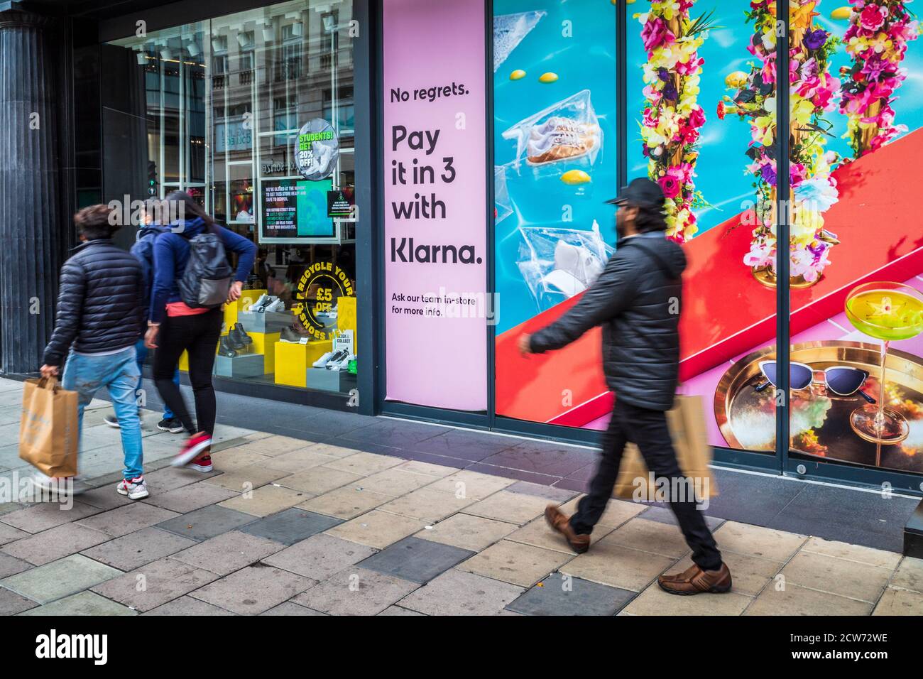 Klarna credit payment scheme. Advertising Klarna available in a store on London Oxford St. Klarna is a buy now pay later system popular with the young Stock Photo