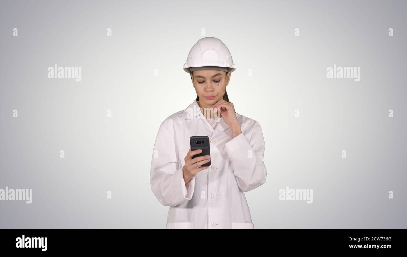 Scientist Using Phone Texting Message on gradient background. Stock Photo