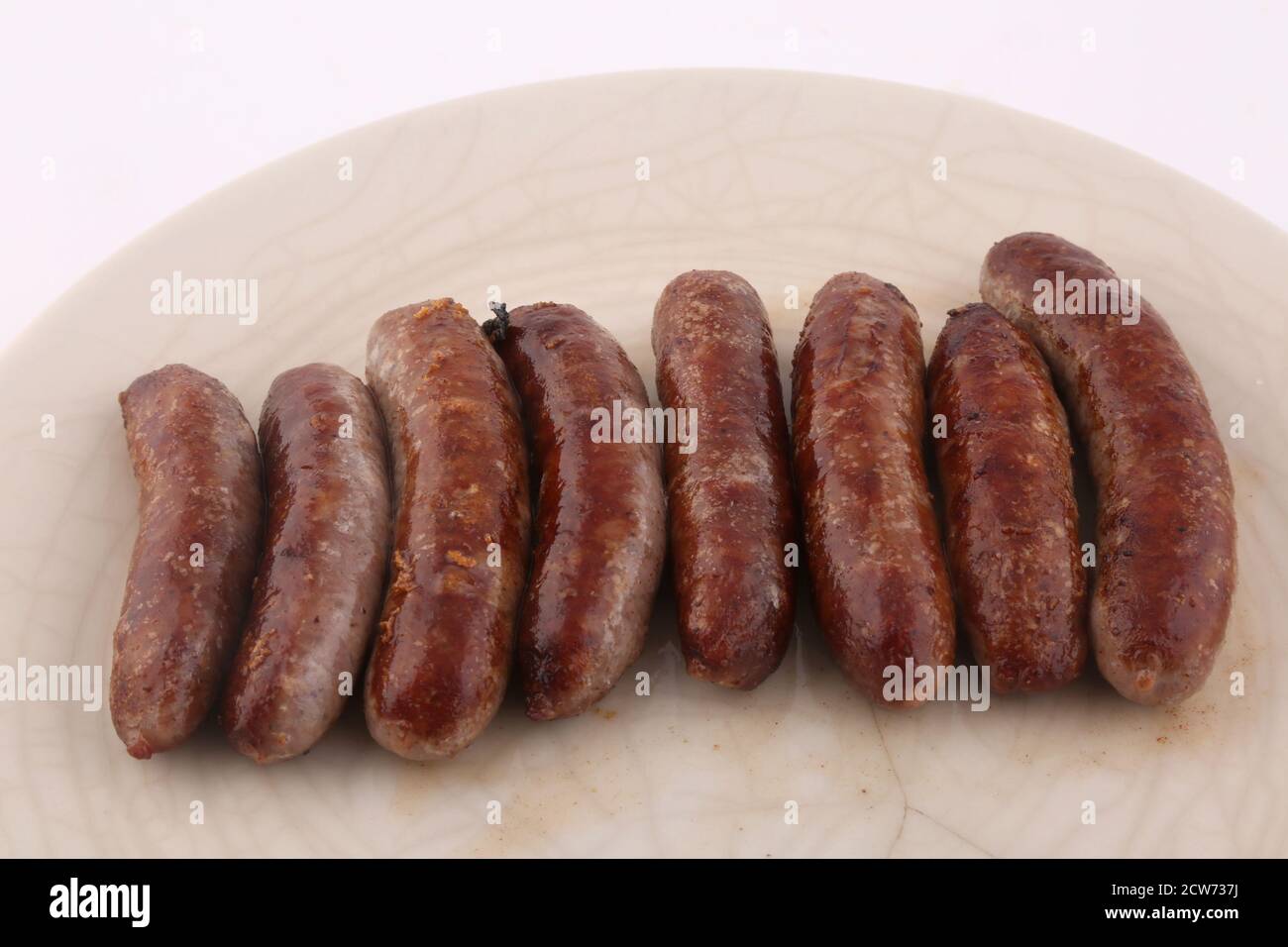 cooked pork sausages with potatoes side Stock Photo Alamy