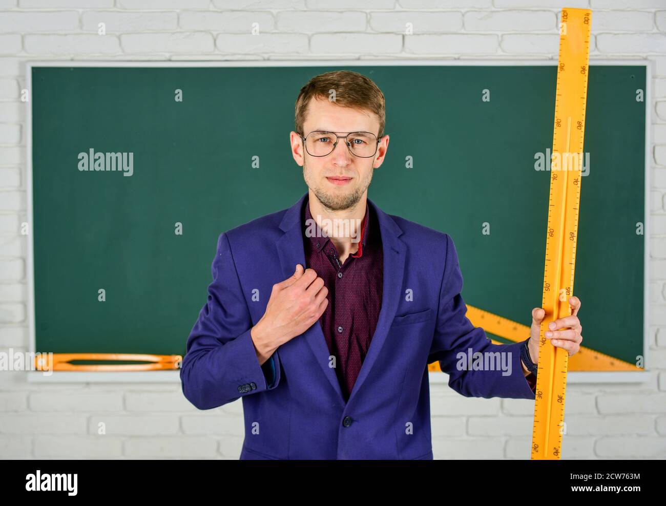 Man Teaching Math man at blackboard. back to school. what size is it. geometry favorite ...