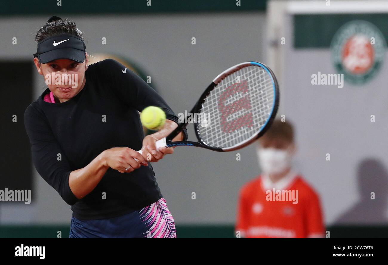 Paris, France. 28th Sep, 2020. Oceane Dodin of France returns the ball during the women's singles first round match against Petra Kvitova of Czech Republic at French Open tennis tournament 2020 at Roland Garros in Paris, France, Sept. 28, 2020. Credit: Gao Jing/Xinhua/Alamy Live News Stock Photo