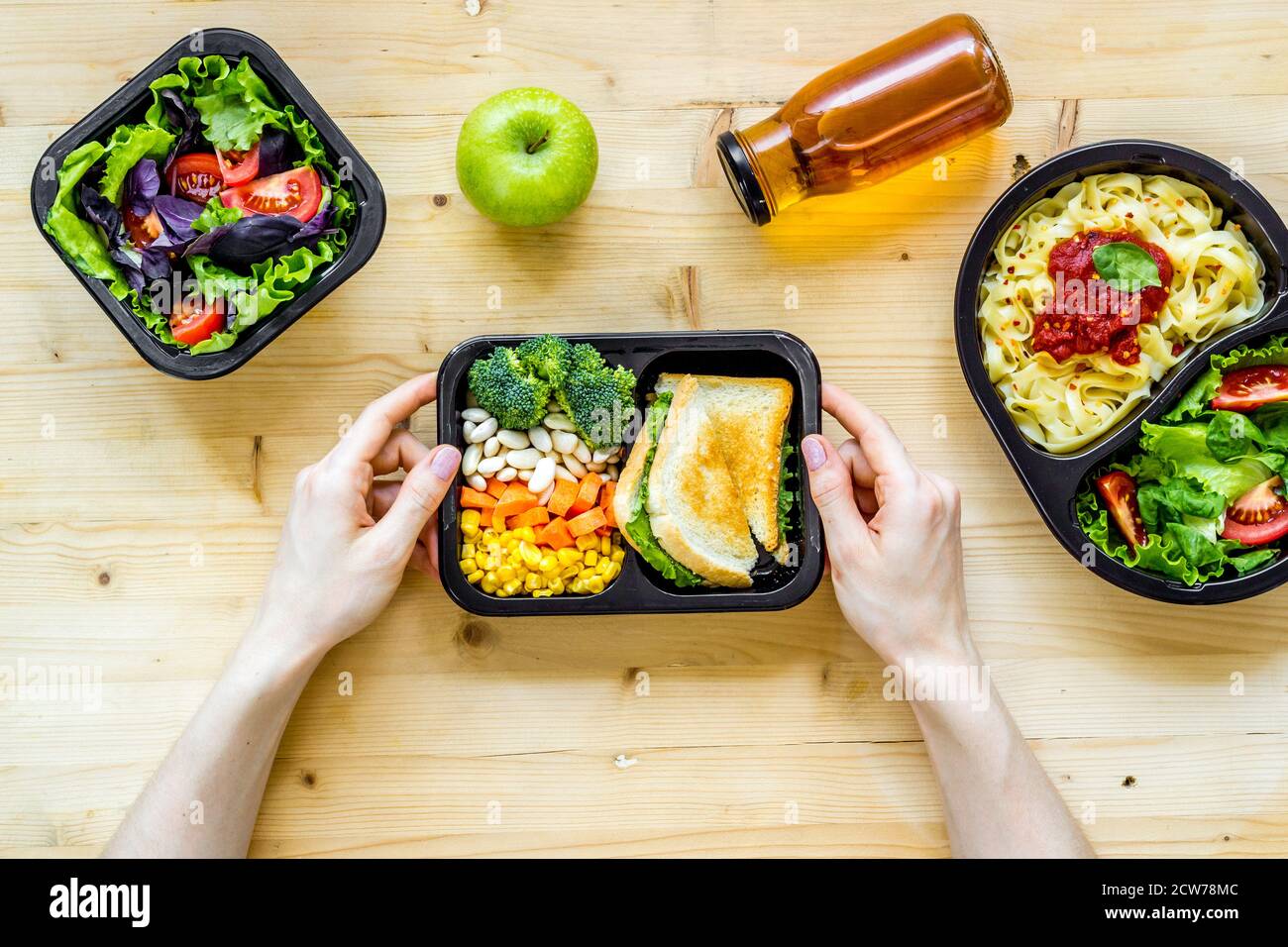 Lunch boxes with meal. Food delivery concept. Overhead view Stock Photo