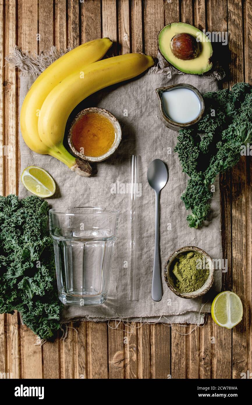 Glass for green healthy vegan smoothie, glass straw. Ingredients above