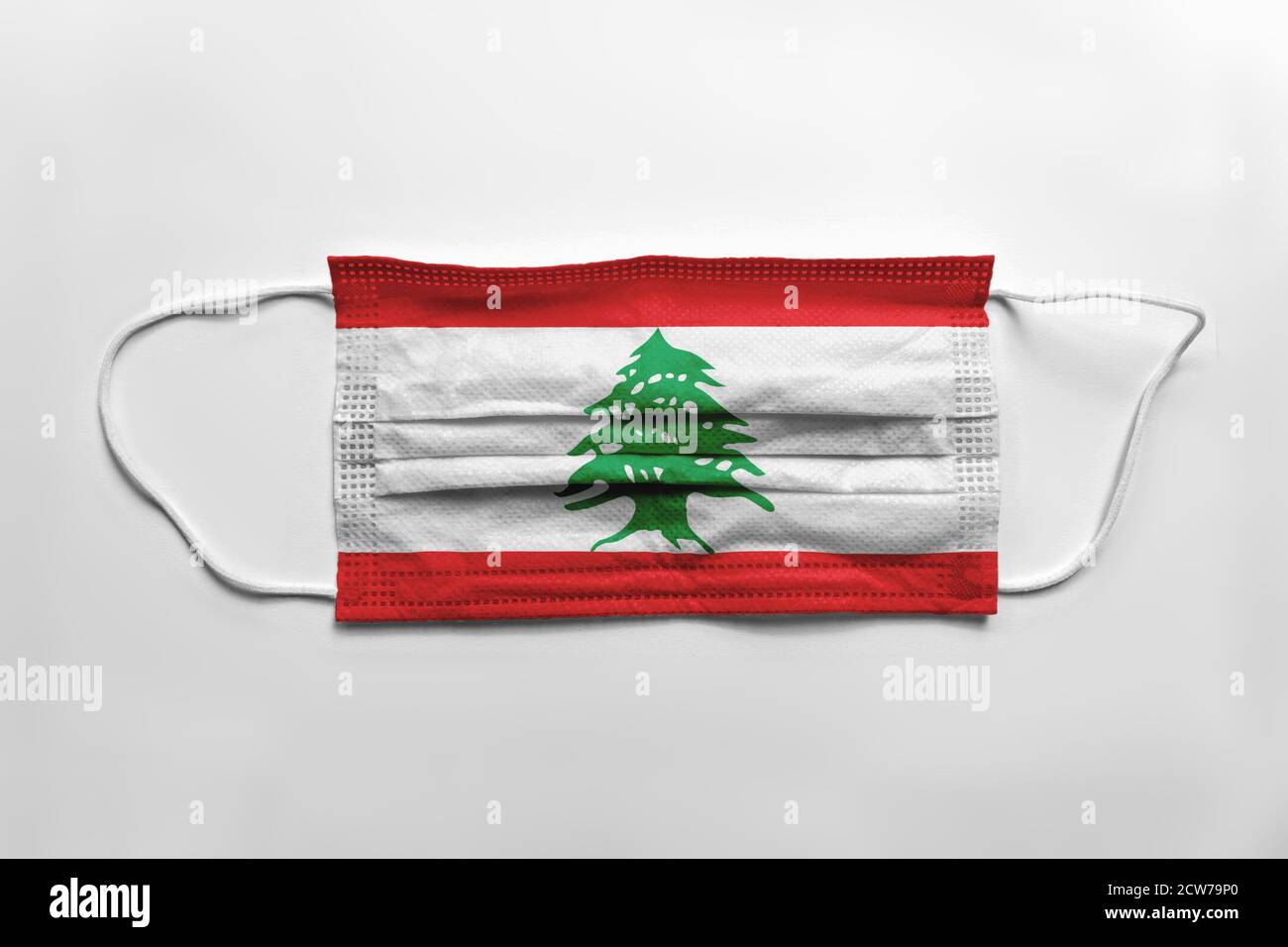 Face mask with Lebanon flag printed, on white background, isolated