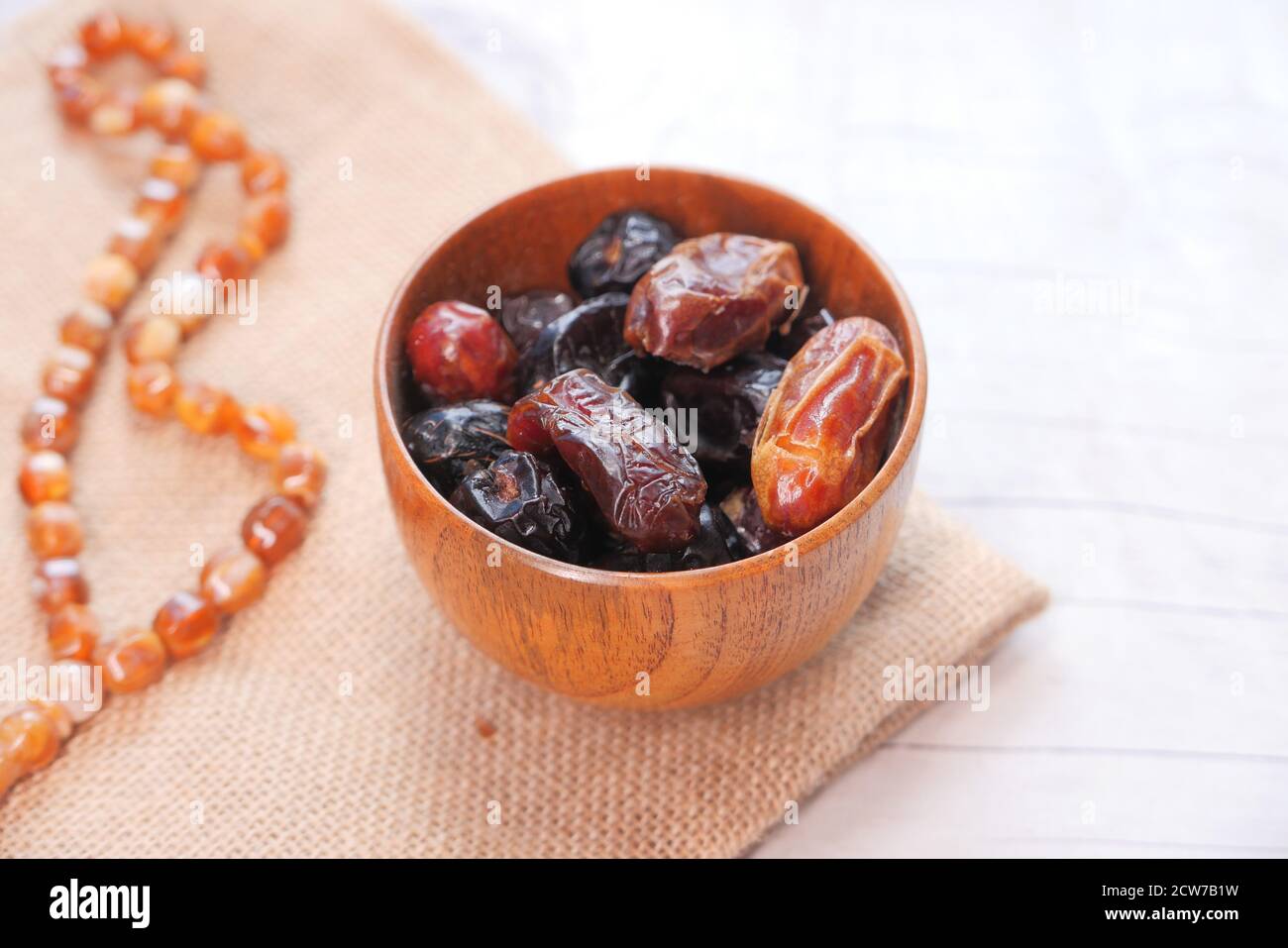 the concept of ramadan, fresh date fruits in a bowl  Stock Photo