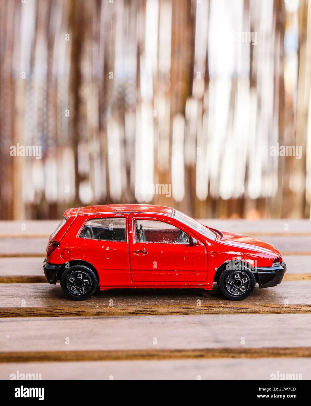 POZNAN, POLAND - Oct 26, 2016: Red Bburago Fiat Bravo toy car on a table Stock Photo