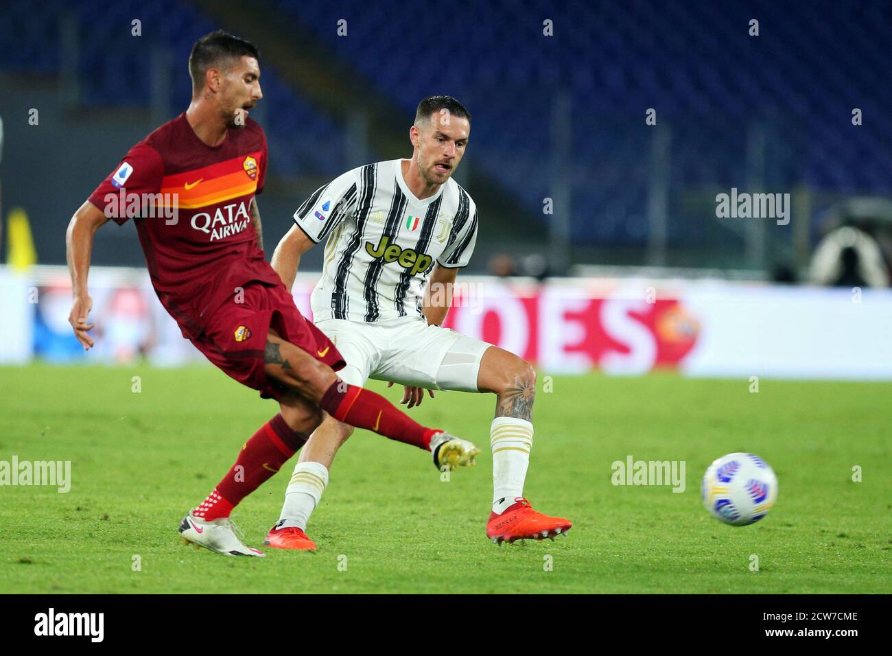 Lorenzo Pellegrini of Roma (L) and Aaron Ramsey of Juventus in action during the Italian championship Serie A football match between AS Roma and Juven Stock Photo